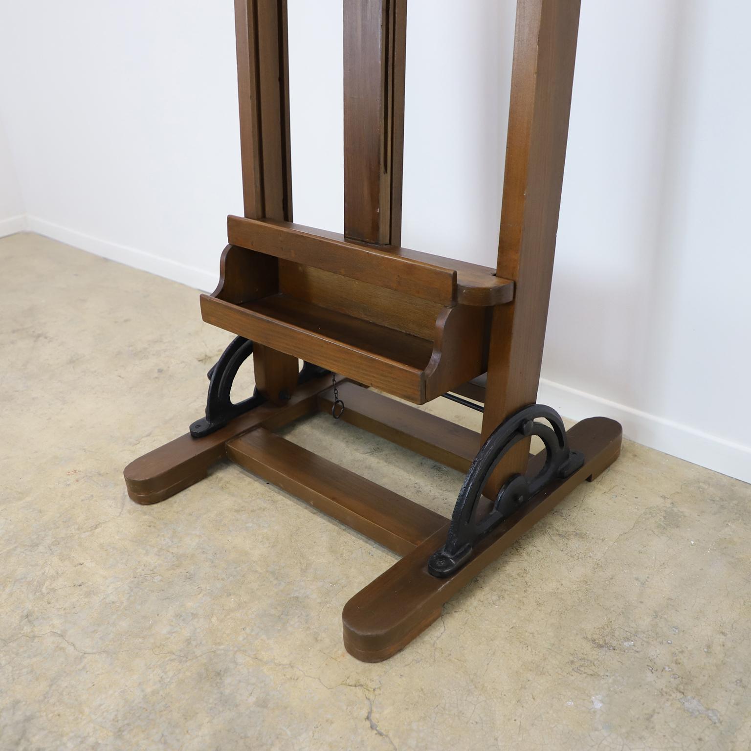 A Mexican wooden adjustable artist easel, circa 1950. This easel has the same design as those currently in the study of Diego Rivera and Frida Kahlo, standing tall, ready for the next Frida Kahlo! Height is adjustable.