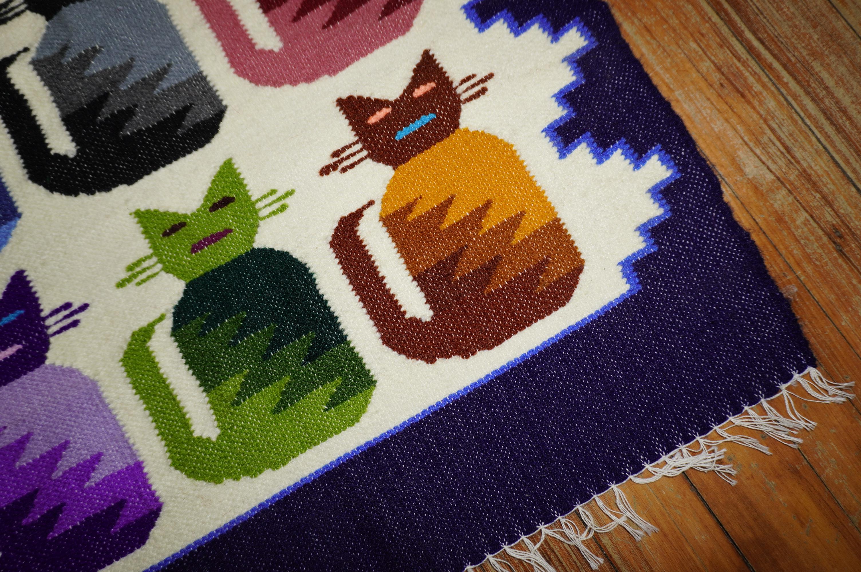 A cute Mexican textile from the late 20th century with 9 different kittens.

Measures: 1'9