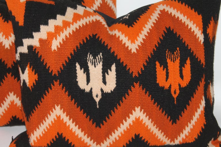 These birds in flight Mexican / American Indian weaving pillows in black and orange colors. The backings are in black cotton linen. Sold in pairs. Two pairs in stock.