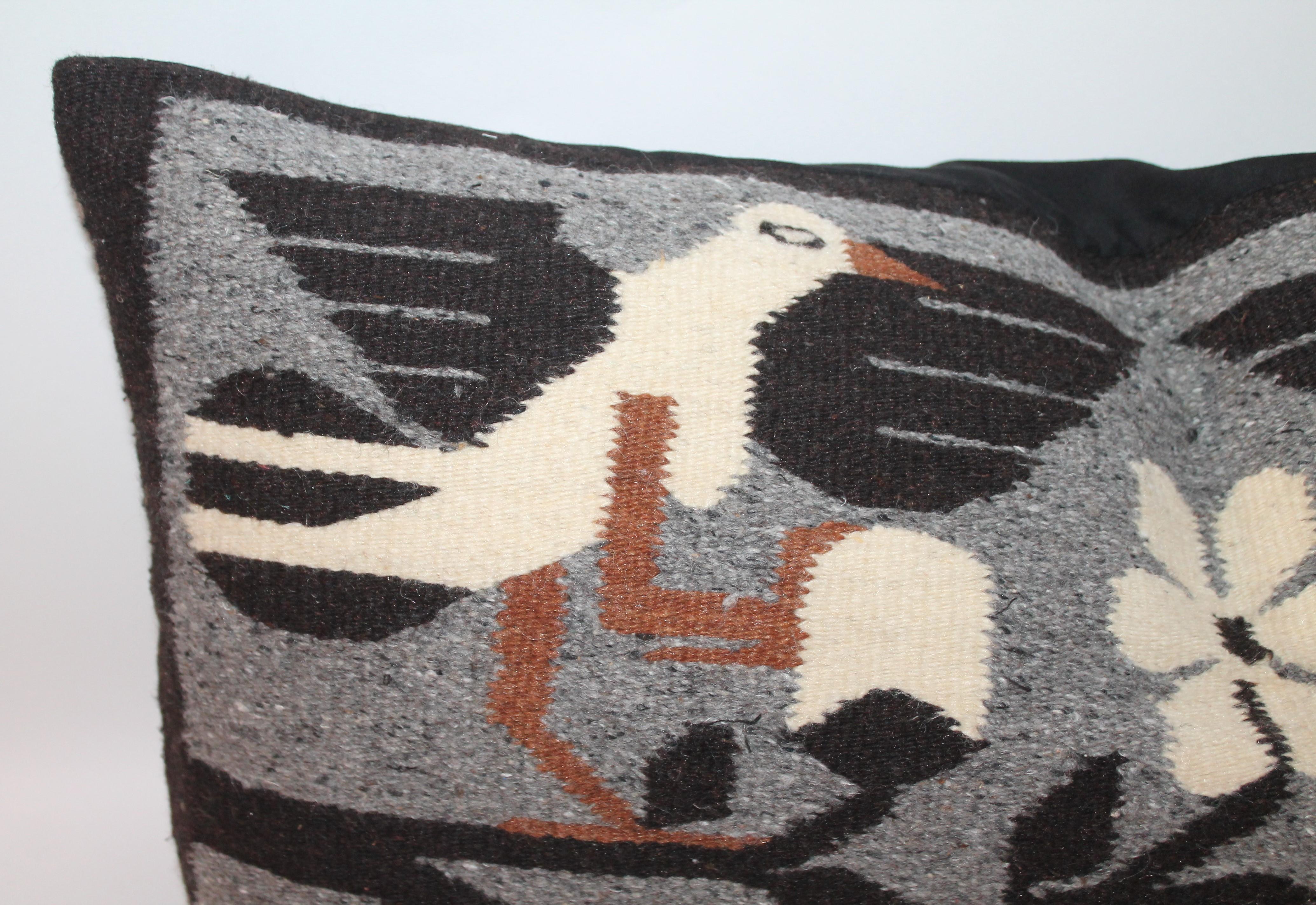 #2 Mexican / Indian weaving bolster pillow with birds is in fine condition. The backing is in black cotton linen.