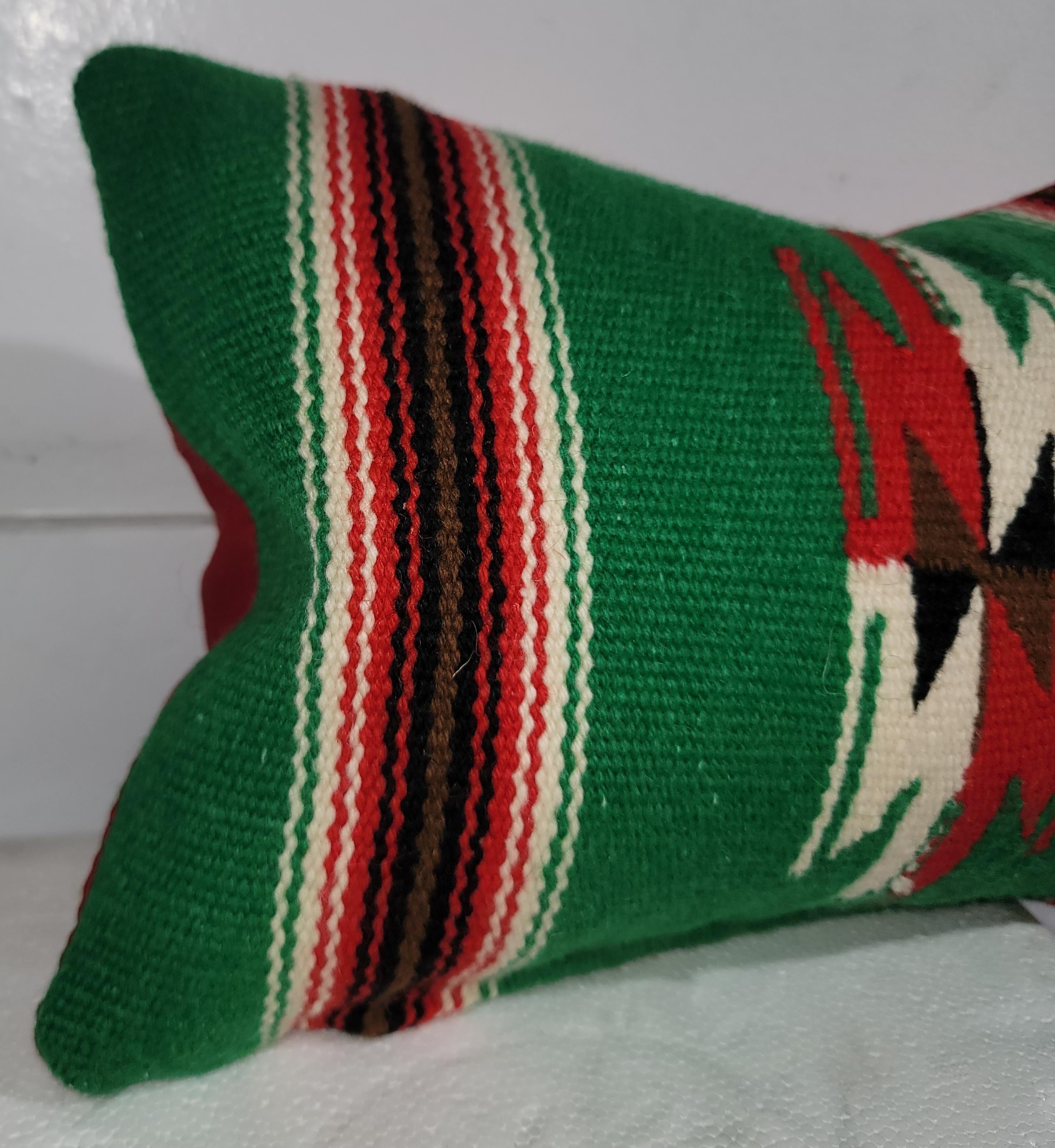This is a fantastic Mexican / AmericanIndian  weaving serape pillow.The backing is in a cotton linen.The condition is perfect !