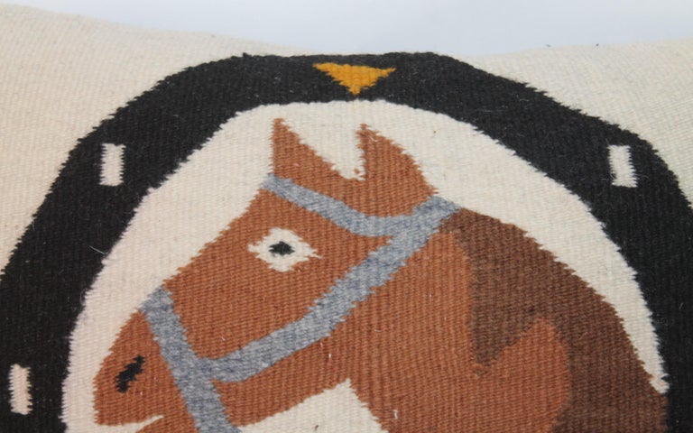 This is a hand woven Horse head and horse shoe pillow is custom made. This handwoven weaving has a cool black suede or leather backing. The insert is down and feather.