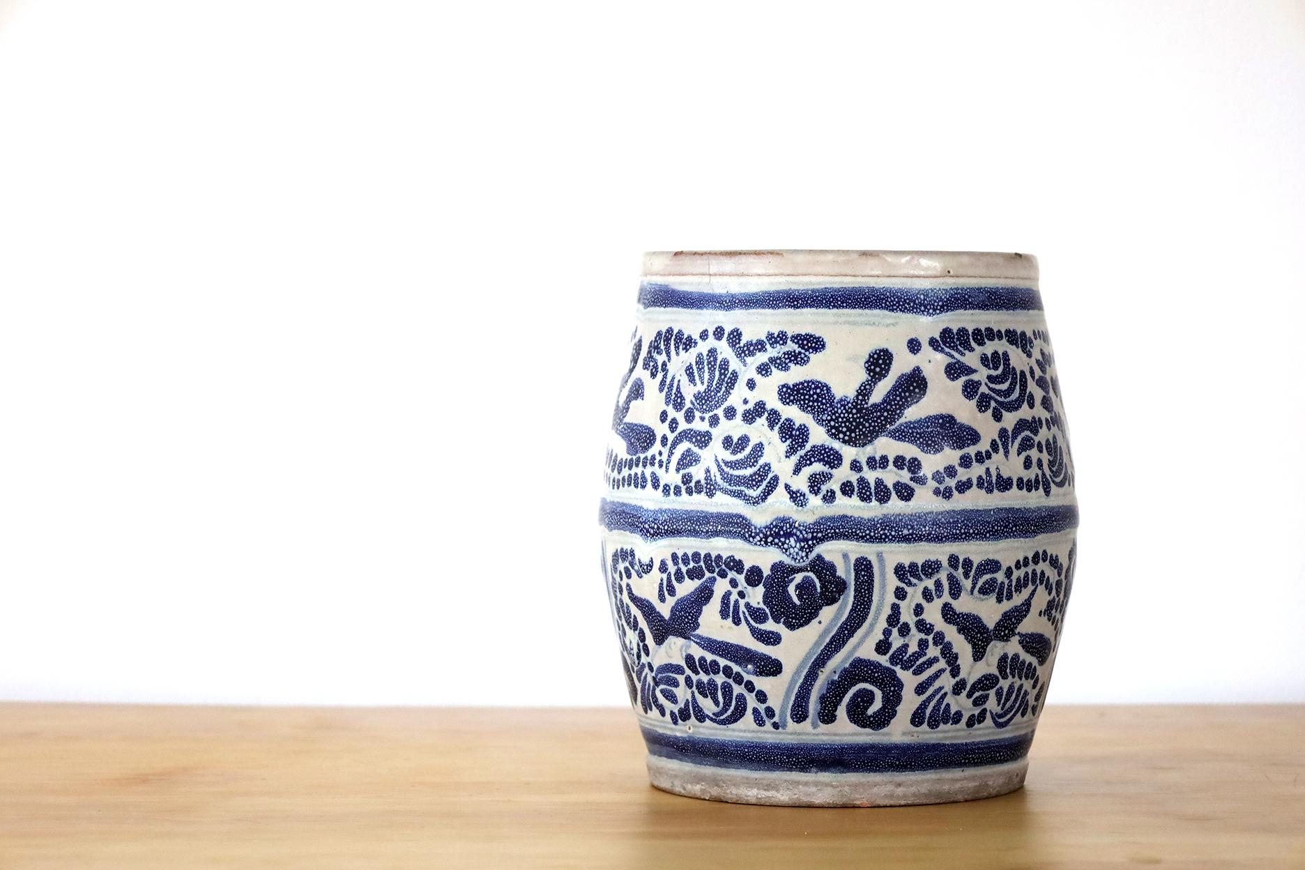 Amazing looks and patina of these vases. Nice texture. Blue ornamental motif.
With or without plants this ceramics fill a room with elegance.


