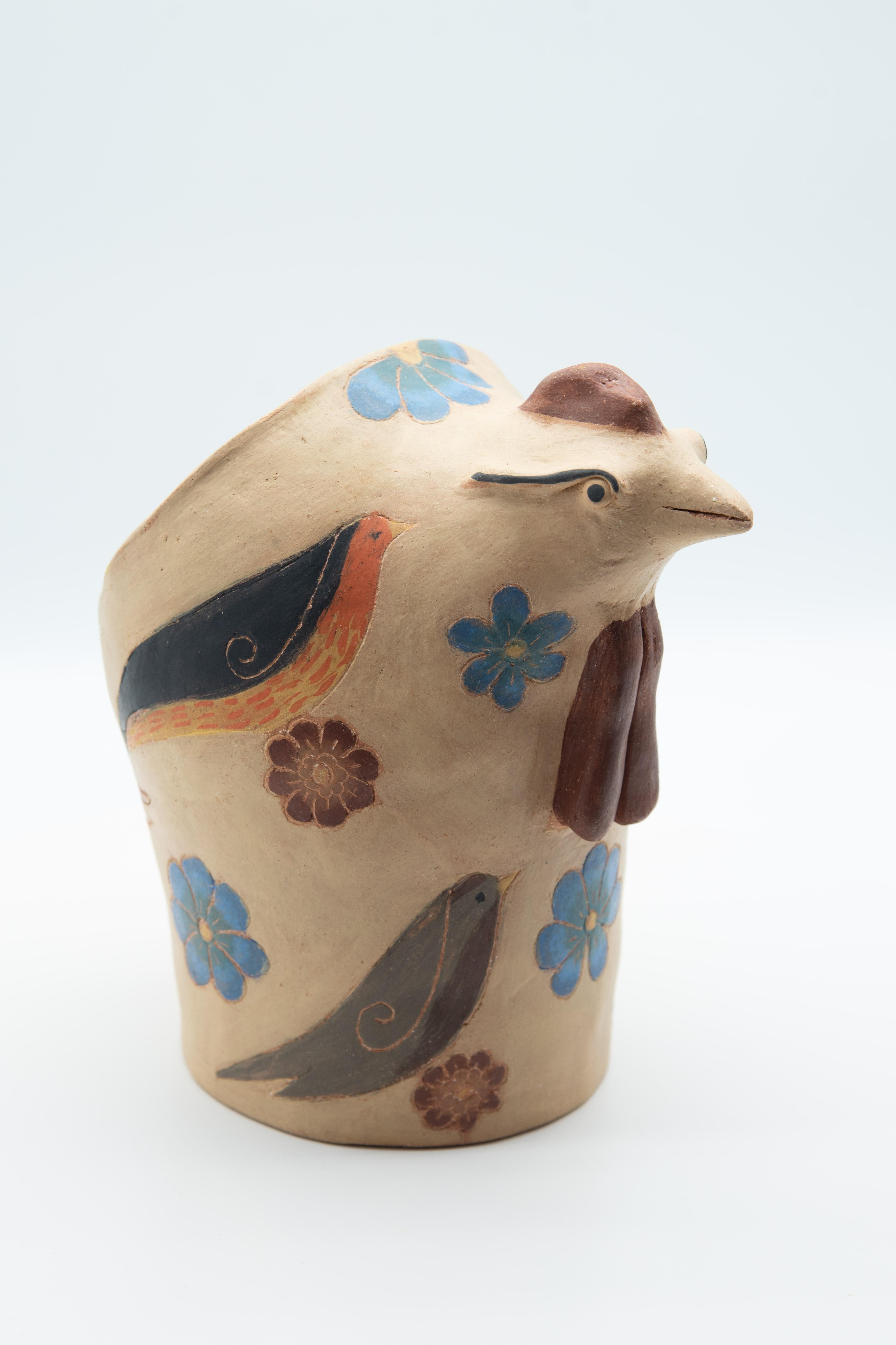 This Mexican ceramic hen is an egg basket, perfect to keep eggs fresh -- a utilitarian kitchen piece by artist Manuel Reyes. Made with clay from Oaxaca and Zacatecas, painted with oxides from the region. Done with the hand-modeled technique and
