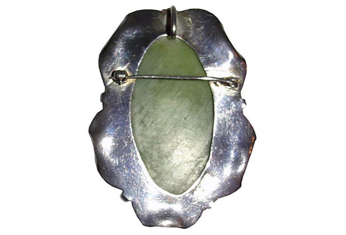 Artisan Mexican Carved Jade Sterling Silver Mask Pendant Brooch For Sale