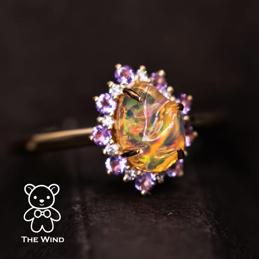 Mexican Fire Opal Amethyst Diamond Engagement Halo Ring 18K Yellow Gold.

Free Domestic USPS First Class Shipping!  Free One Year Limited Warranty!  Free Gift Bag or Box with every order!

Opal—the queen of gemstones, is one of the most beautiful
