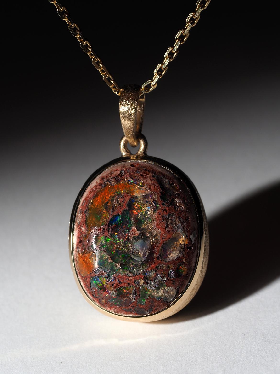 Mexican Fire Opal gold plated silver pendant 
weight of the gemstone - 19.5 carat 
gemstone origin - Mexico 
gem size is 0.75 x 0.87 in / 19 x 22 mm
pendant length - 1.26 in / 32 mm
pendant weight - 6.6 grams