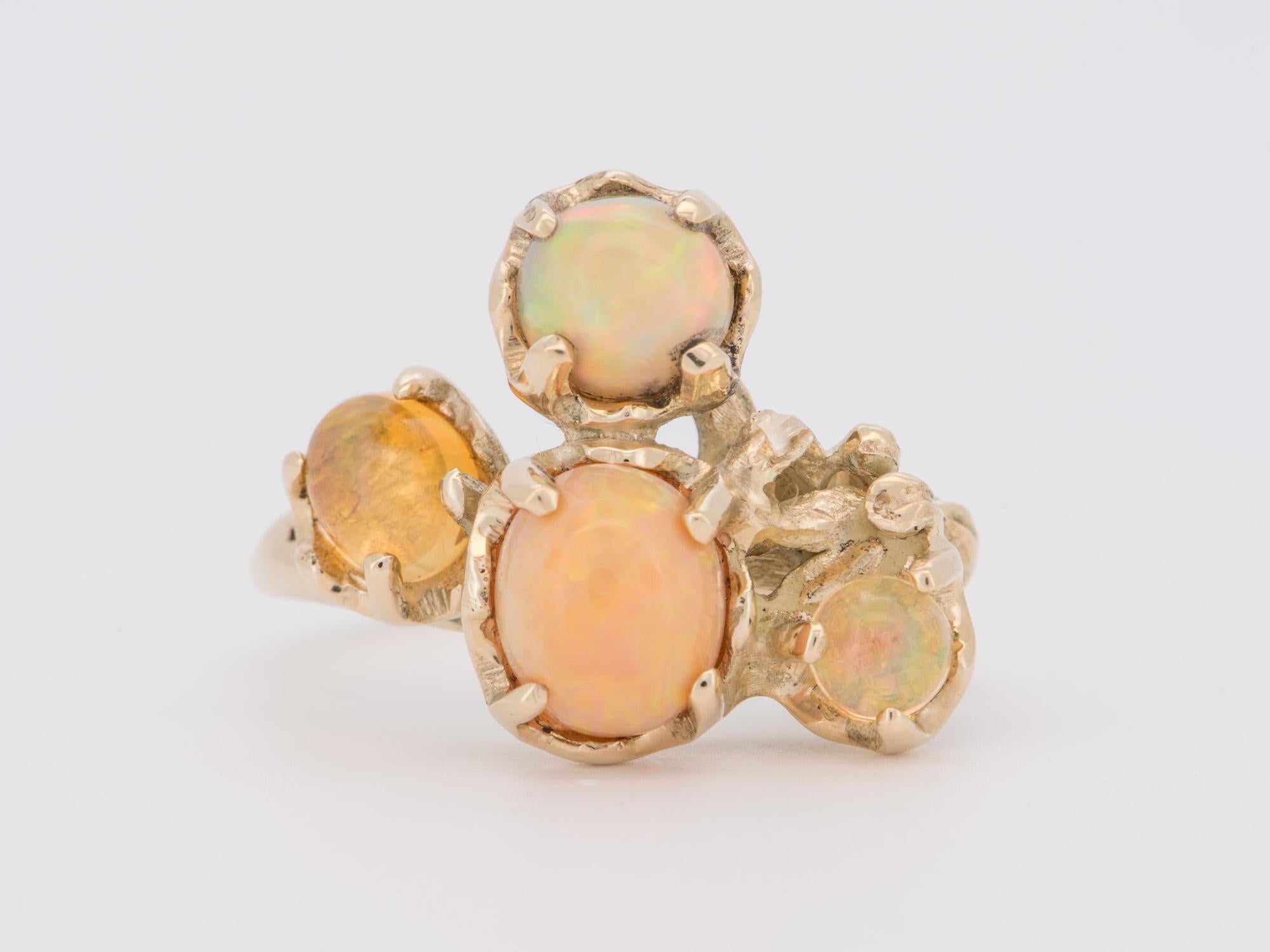 ♥ Mexican Fire Opal Organic Branch Ring 14K Gold
♥ The face of the ring measures 21.5mm in width (East West direction), 17.3mm in length (North South direction), and sits 8.8mm tall from the finger. The band is 2.1mm wide.

♥ US size 7 (Free