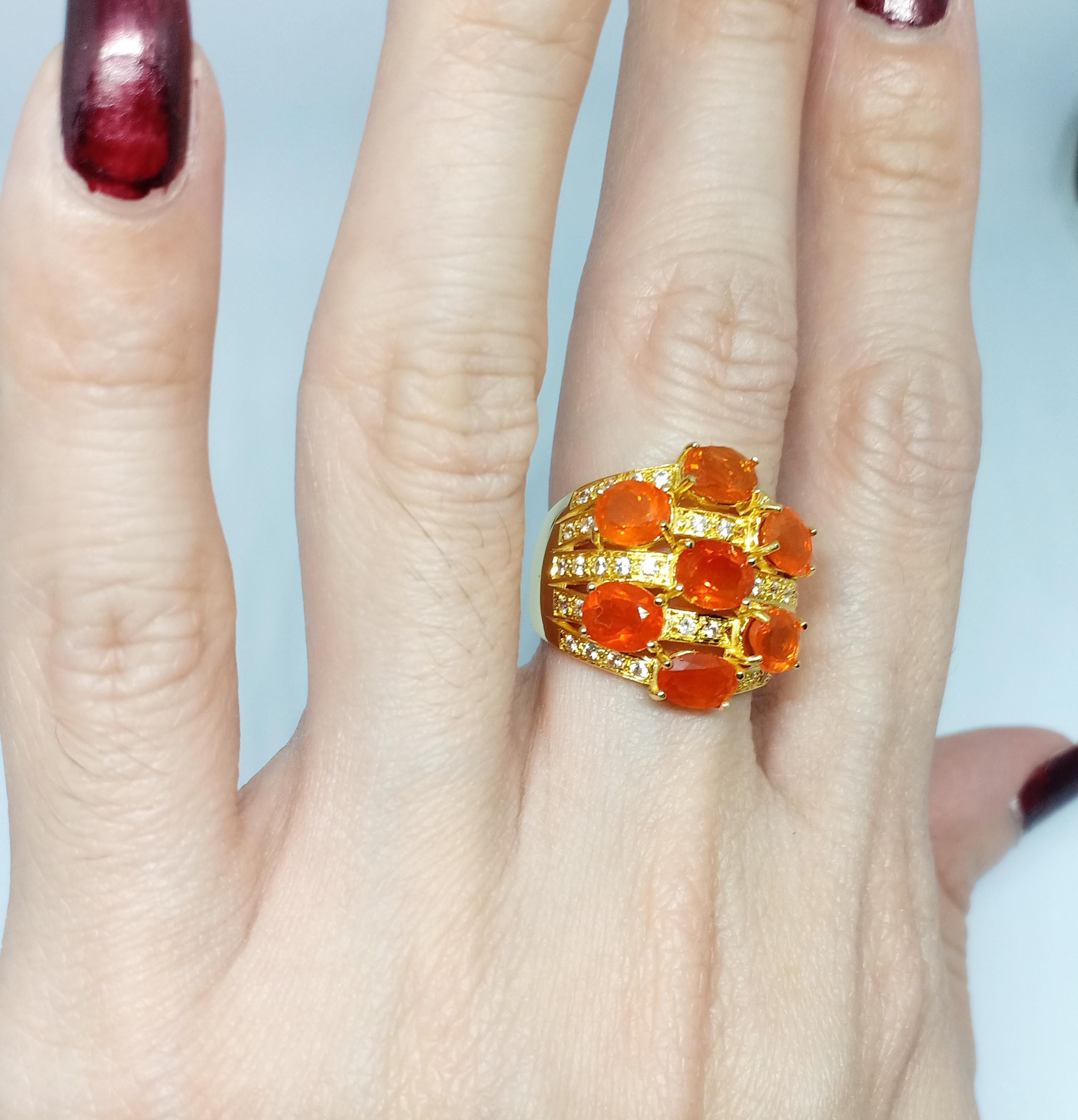 mexican fire opal ring. (3.38cts) 18K gold plated over sterling silver. 4