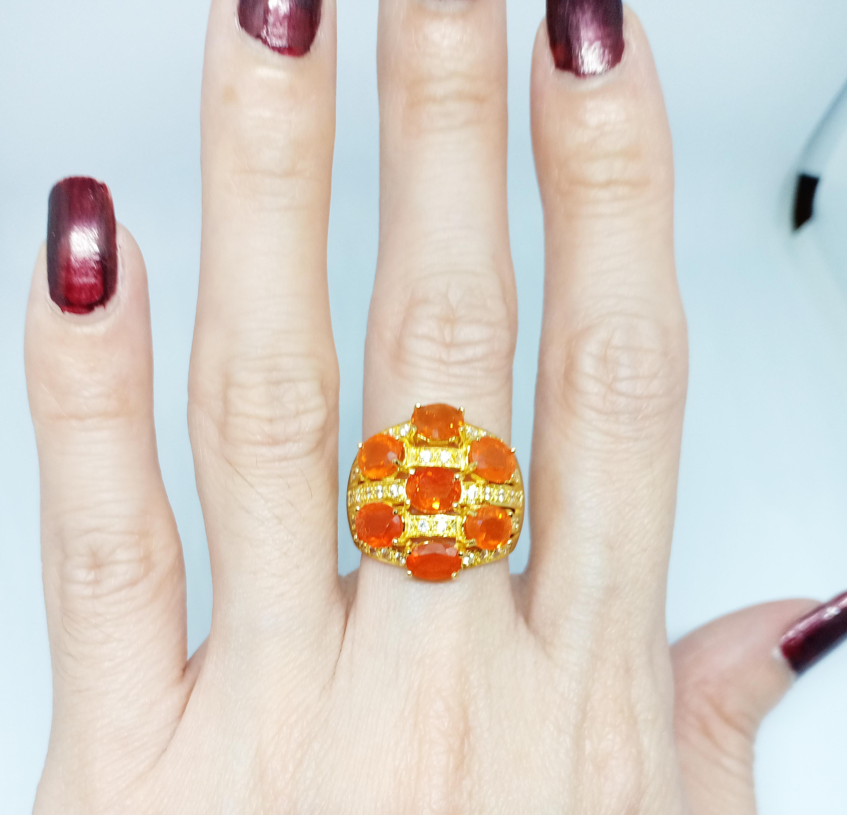 mexican fire opal ring. (3.38cts) 18K gold plated over sterling silver. 3