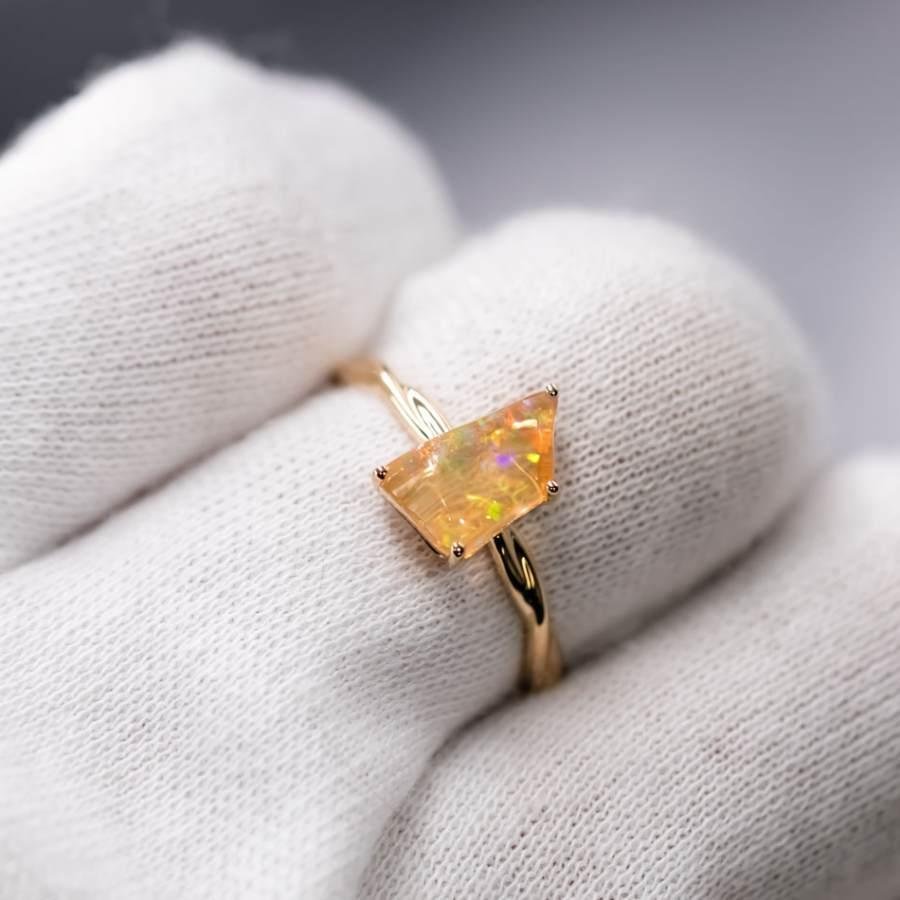 Mexican Fire Opal Twist Band Engagement Ring 18K Yellow Gold.


Free Domestic USPS First Class Shipping! Free Gift Bag or Box with every order!

Opal—the queen of gemstones, is one of the most beautiful gemstones in the world. Every piece of opal is