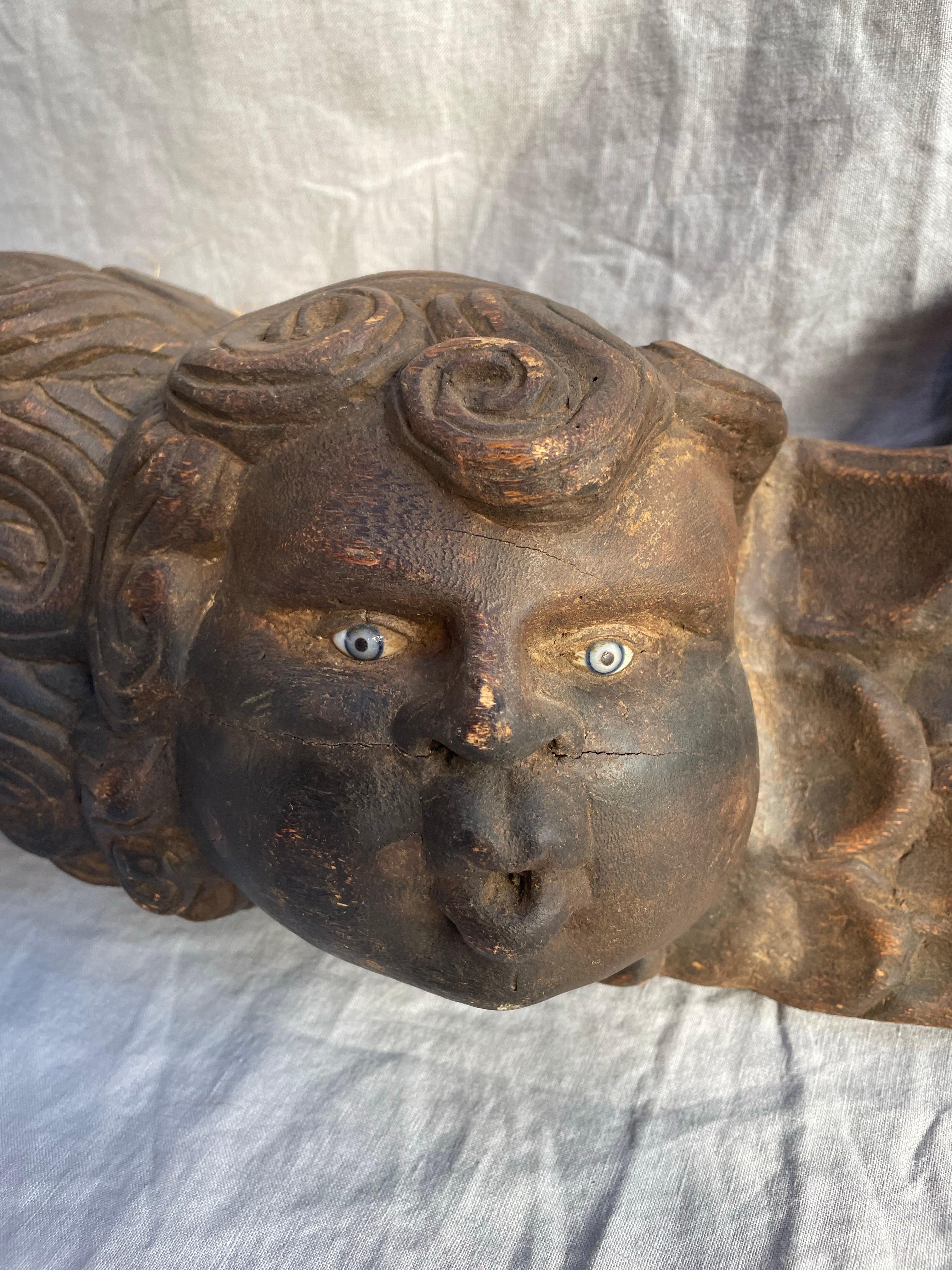 XIXe siècle Art populaire mexicain Double chérubin sculpté en bois polychrome en vente