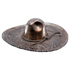 Sombrero mexicano de plata con aplicación de cordón y grabados en relieve