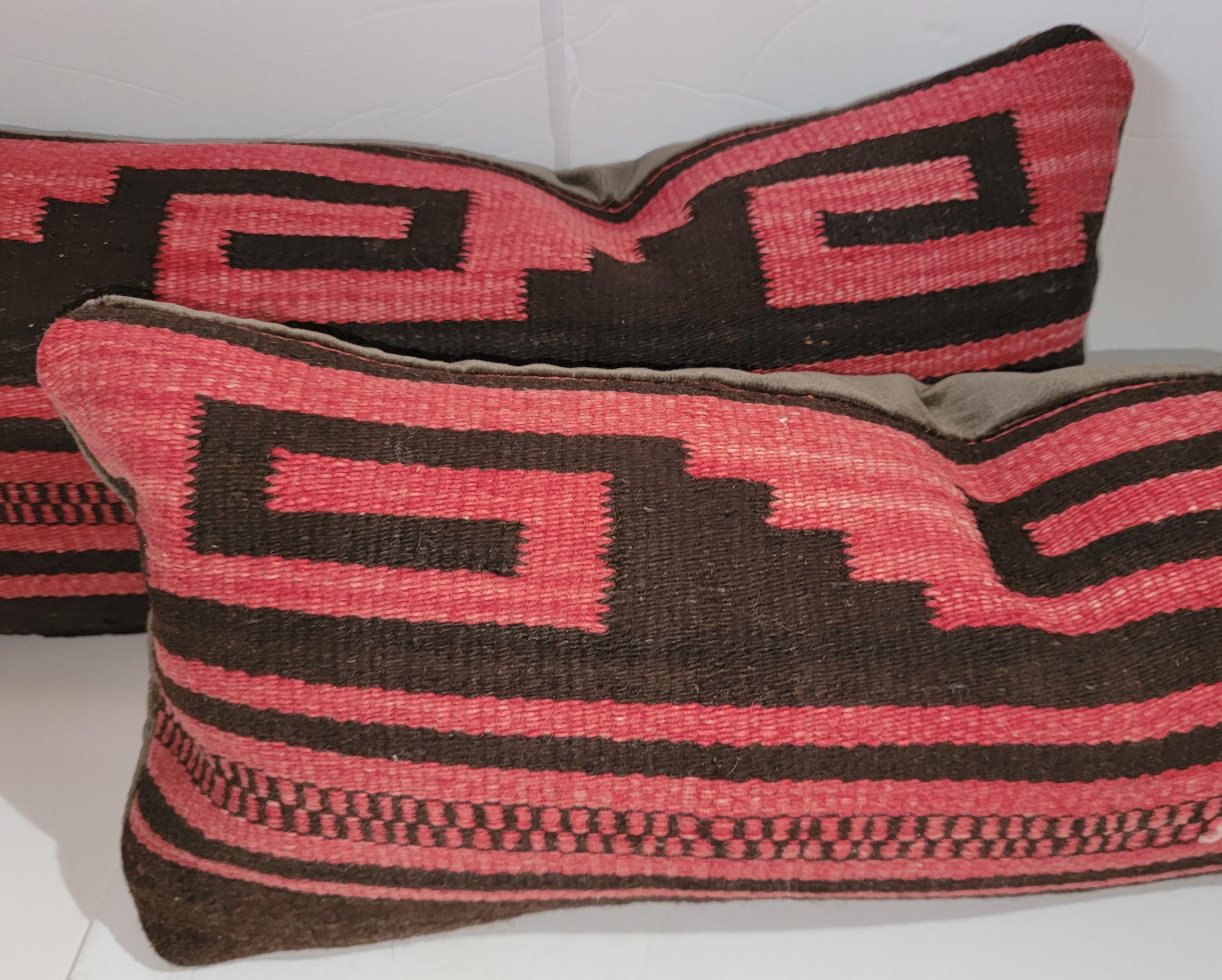 Mexican Indian weaving bolster pillows - pair.. Feather and down inserts and zippered shams.