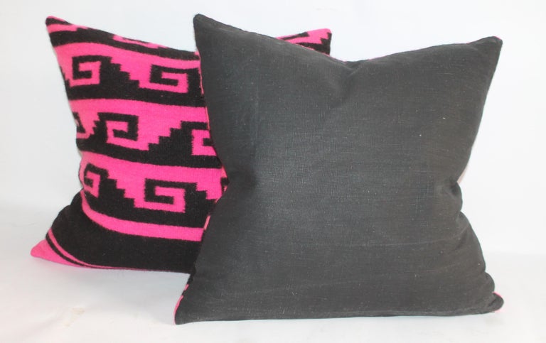 This pair of bright and bold pink & black Navajo Indian weaving pillows have black cotton linen backings.