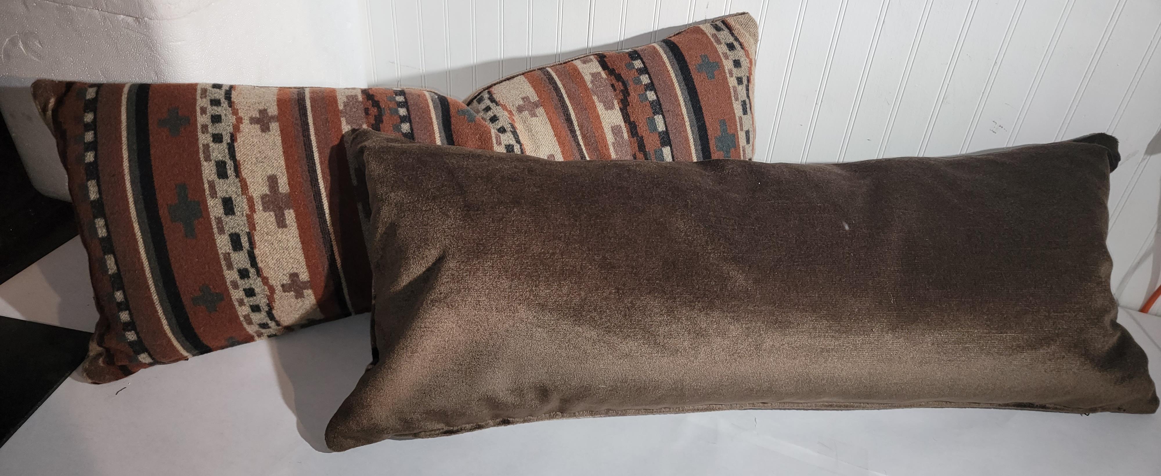 Pair of Earthy toned Mexican Indian weaving pillows with beautiful brown mohair backing. Soft to the touch and great earthy colors provide a sense of nature. The interior of the pillows is a custom made down and feather insert. 