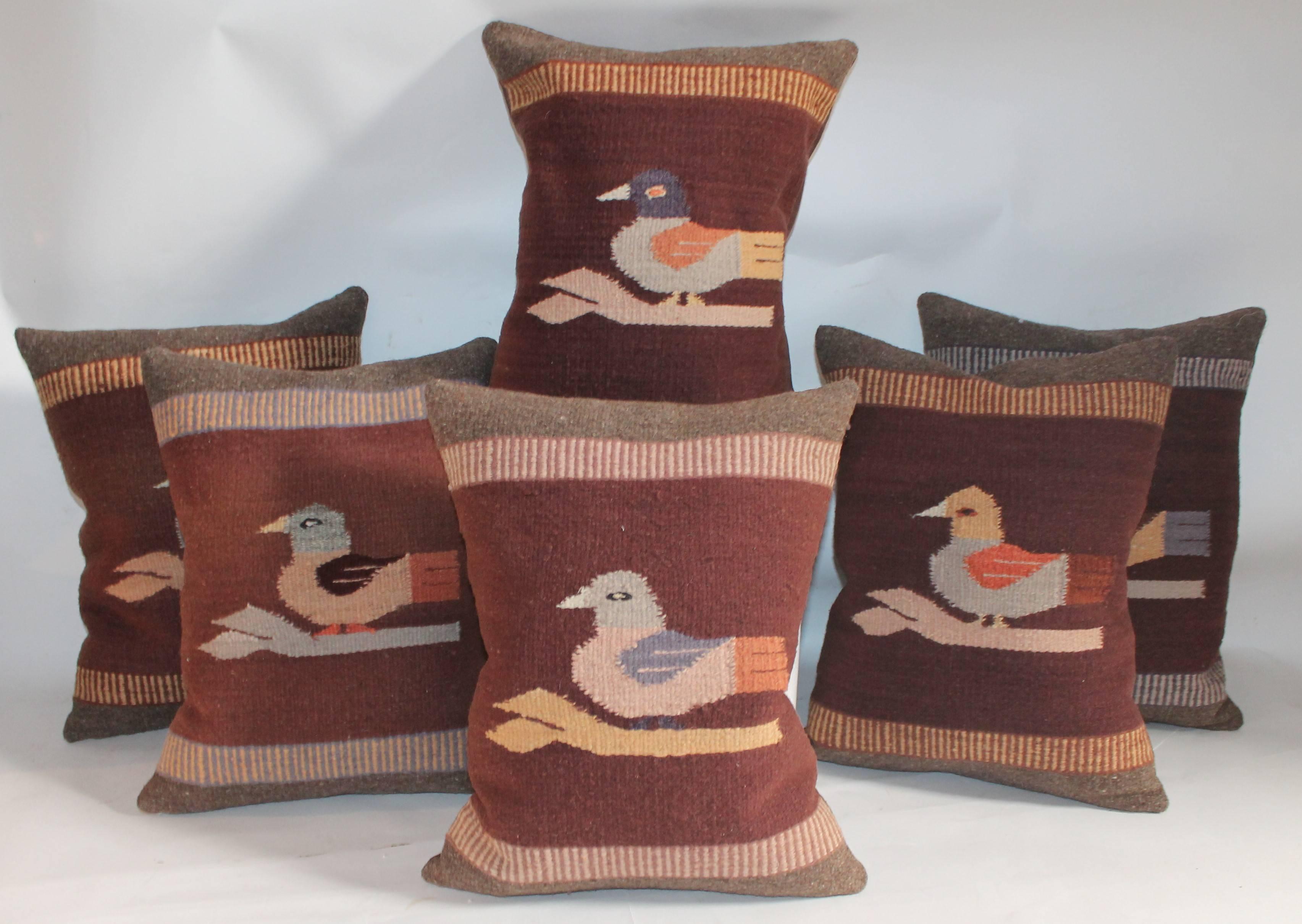 These amazing handwoven bird weaving pillows have brown cotton linen backings. Sold individually for $495. Each. They are in Fine condition. Total of six pillows in stock.