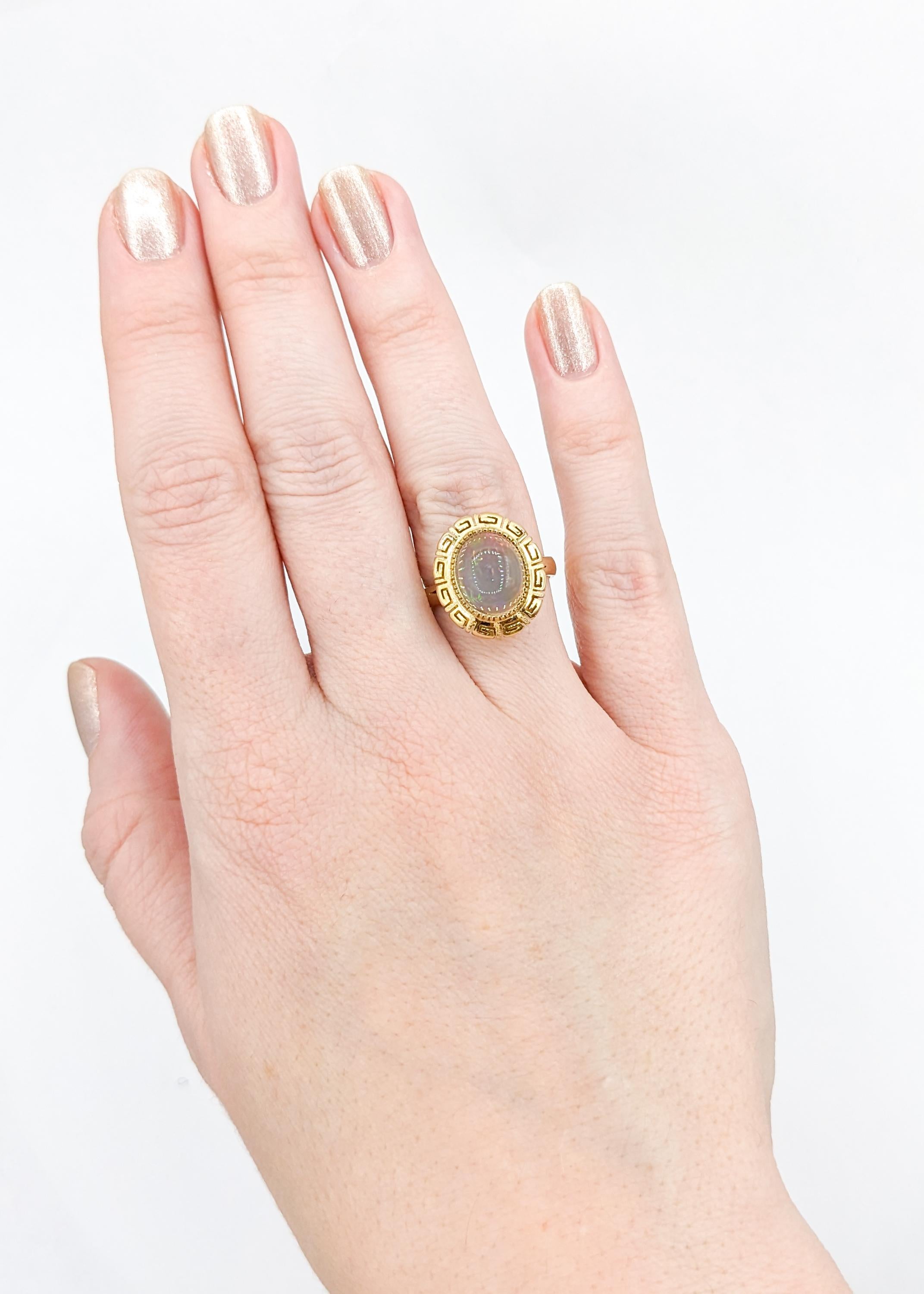 Mexican Jelly Opal Ring in 14K Gold

Elevate your style with this Mexican jelly opal ring, meticulously crafted in radiant 14-karat yellow gold. Adorned with a captivating 11x9mm Mexican Jelly Opal, this gemstone showcases its natural beauty with an