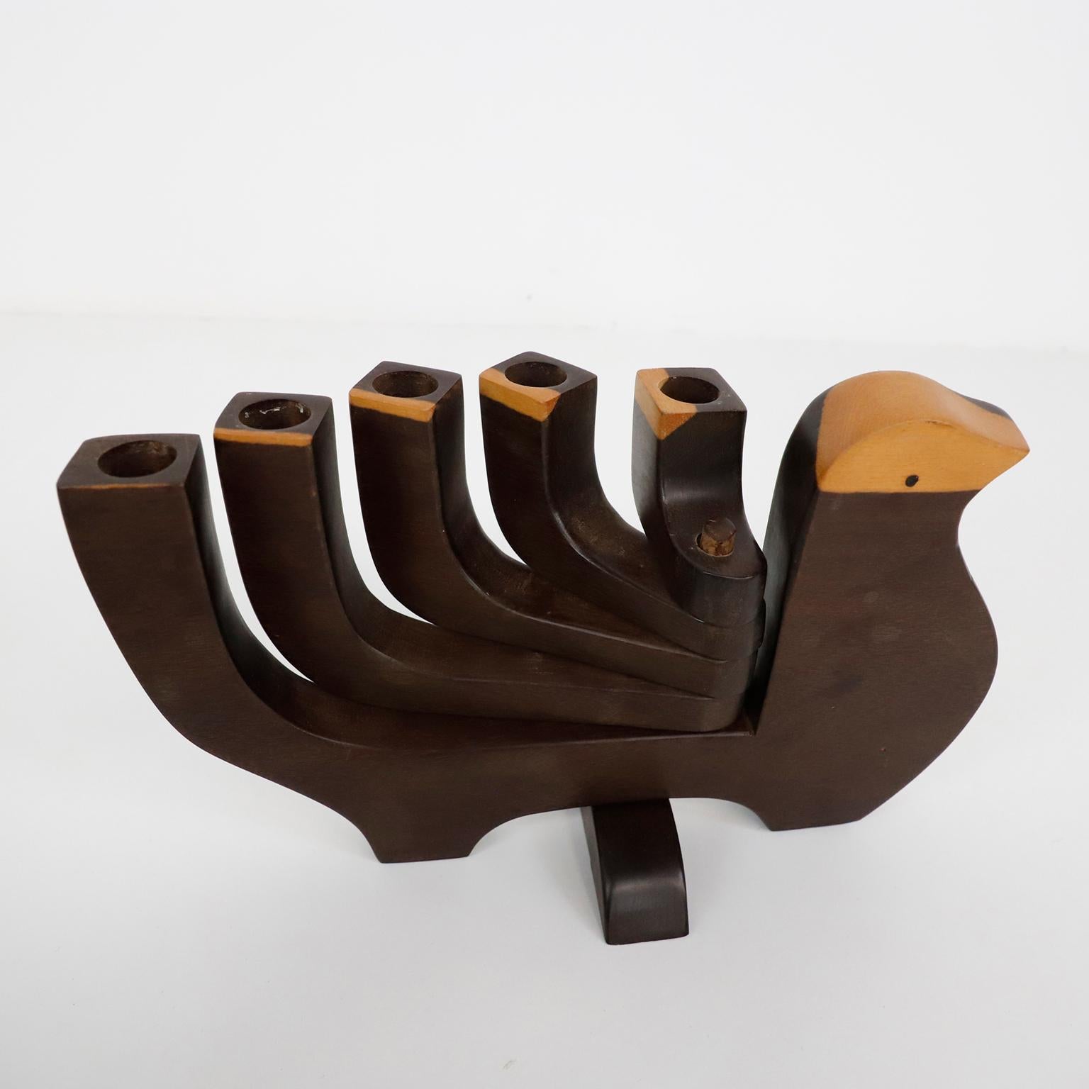 Circa 1960, we offer this Mexican mid century 5 candle holder made in Katalox (tropical wood). This is a great bird shaped adjustable candle holder that holds 5 thin taper candles.