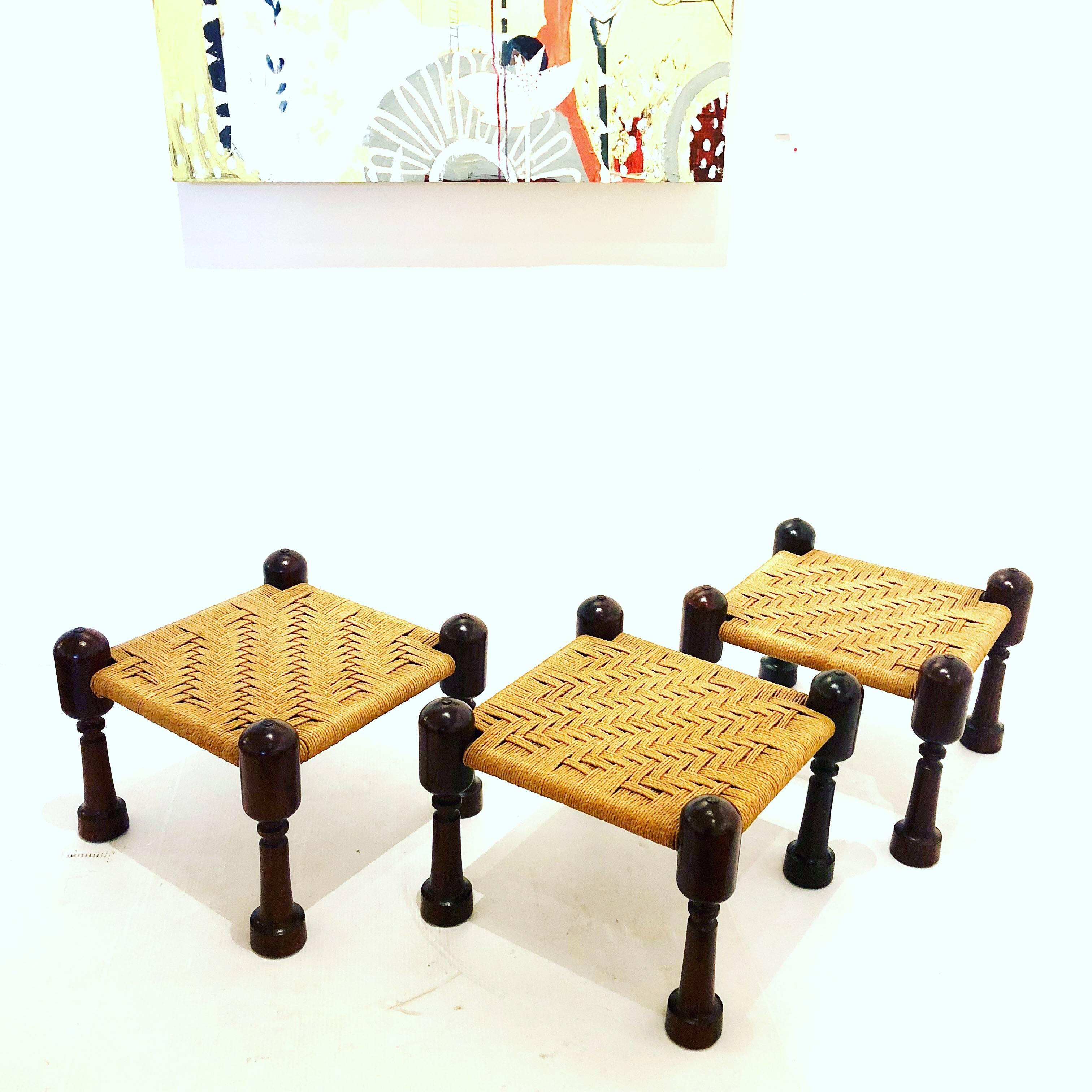 Beautiful and unique sculpted legs in solid cocobolo wood and handwoven seats, low stools, circa 1950s. Very nice condition.