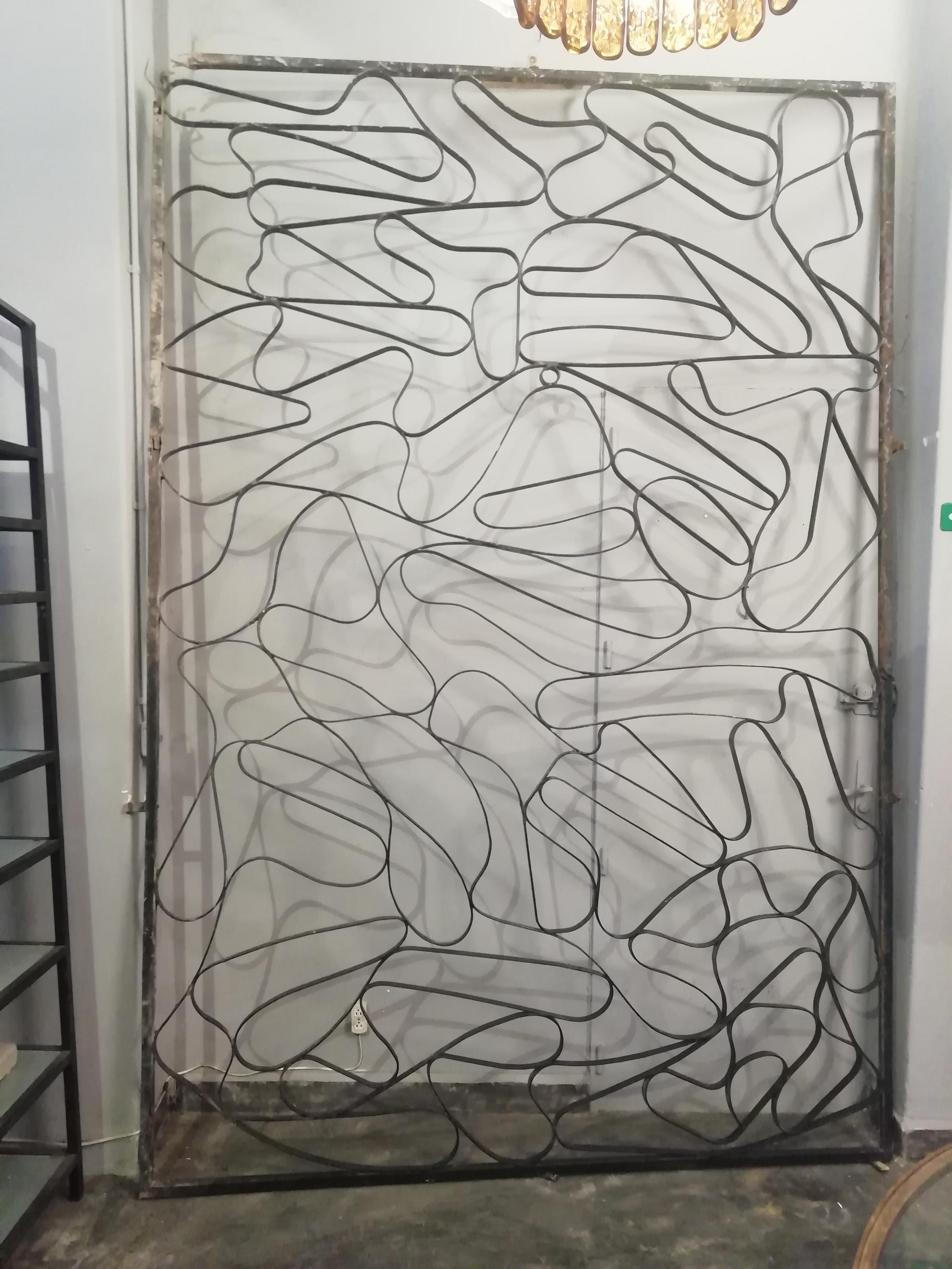 Interesting 1970s Mexican Mid-Century Modern steel screen. The organic design can be used as the frame for a stained glass window.