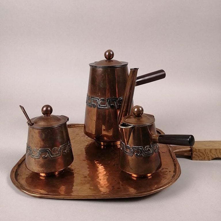An early 1950's Taxco, Mexico copper and silver plate coffee set by Ana María Núñez de Brilanti, 