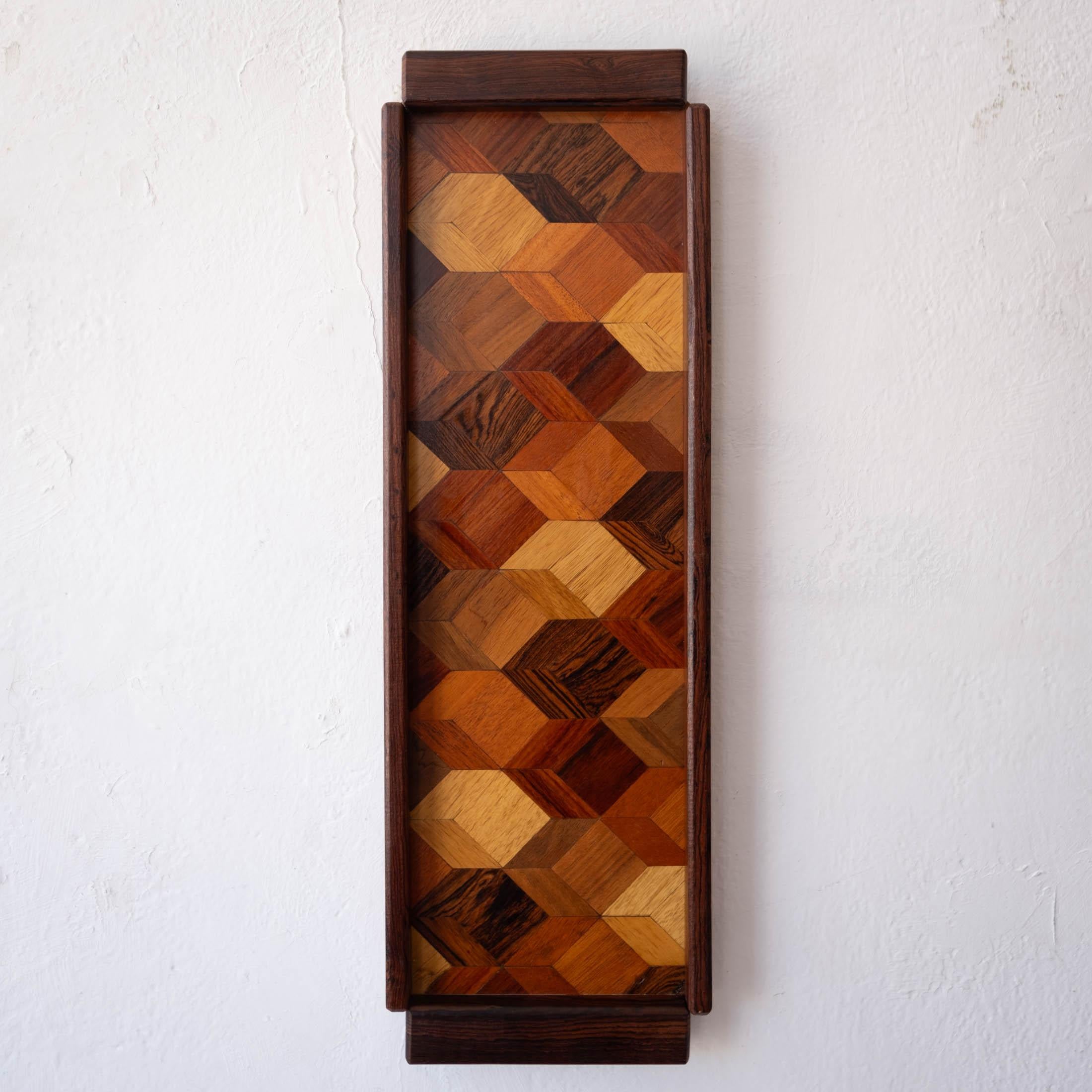 Tray by Mexican Modernist Don Shoemaker, from his workshop in Señal Mexico. Beautiful geometric inlaid marquetry of mixed exotic woods. Can be mounted on the wall. 

Designer Don Shoemaker ( was born in Nebraska and studied at the Art Institute of