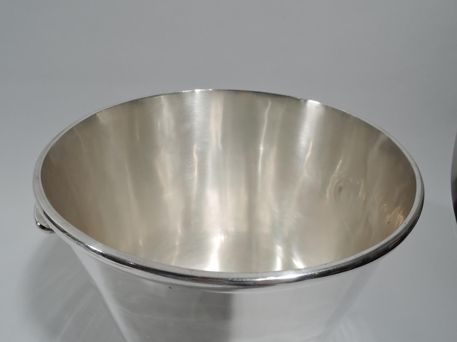 Mexican modern sterling silver ice bucket. Straight and tapering sides and bracket side handles. Capacious with nice heft. Marked. Weight: 29 troy ounces.