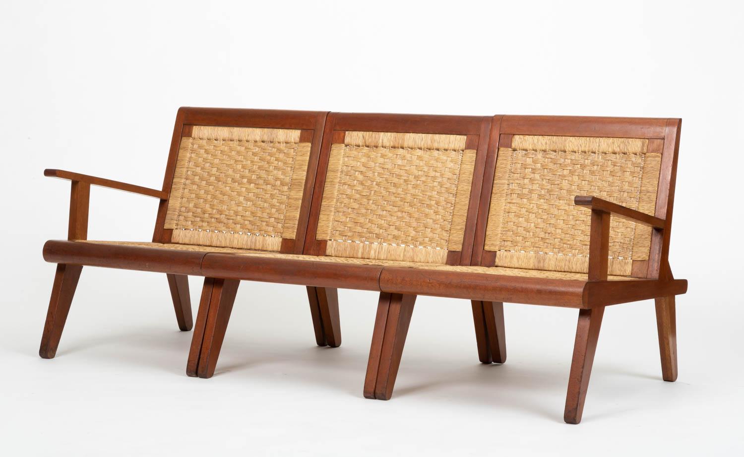 Bauhaus-trained, Mexico city based Michael van Beuren created highly functional modern design inspired by Mexican vernacular styles and materials. This example is a modular sofa/lounge chair with a teak frame. The back and seat are strung with