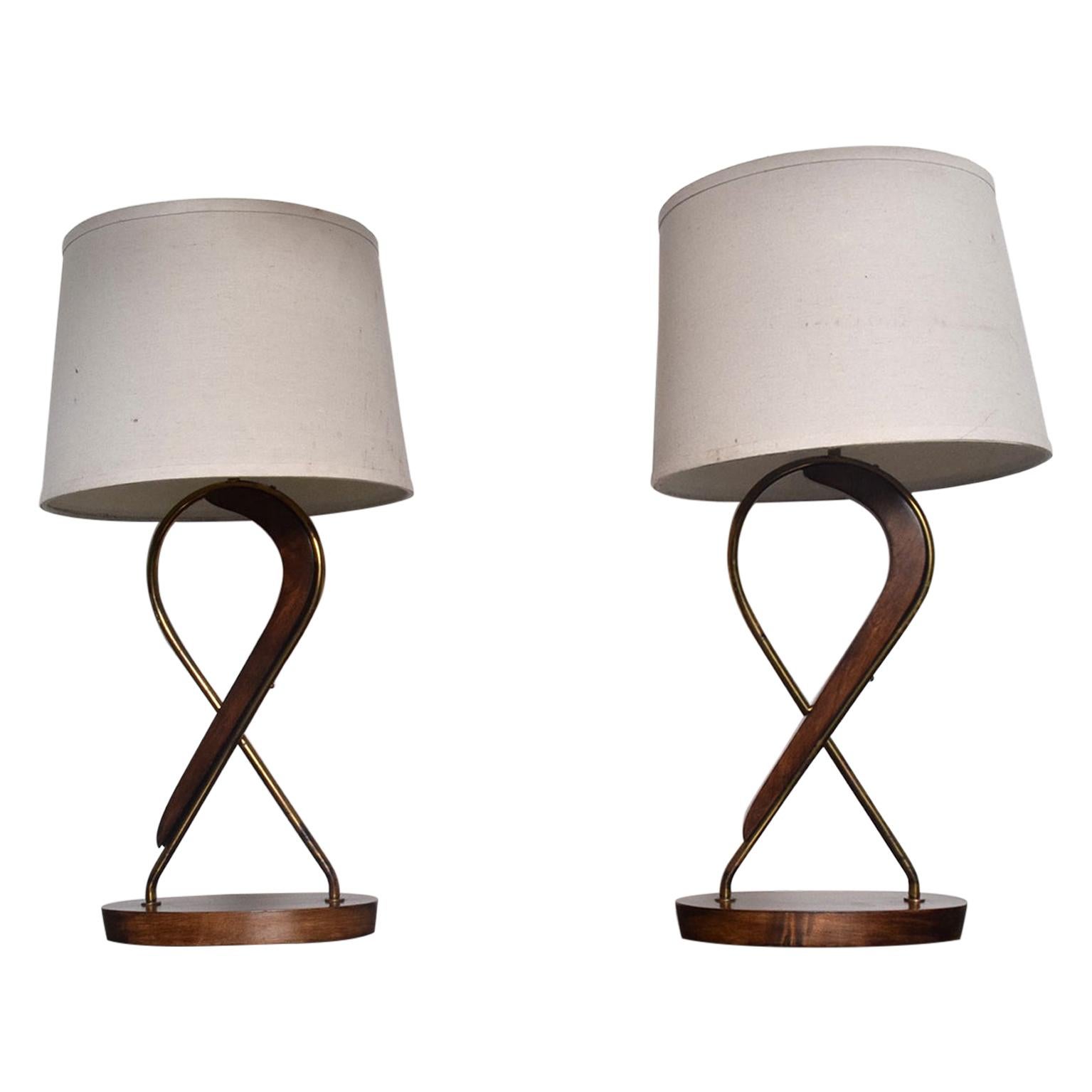 Table Lamps
Pair of mahogany table lamps by Eugenio Escudero Mexico 1950s Mexican Modernism
Sculptural mahogany wood and brass. Swirling organic presentation.
Unmarked.
Lamp shades are not included, for display only.
H 20 in. x W 10.5 in. x D 5