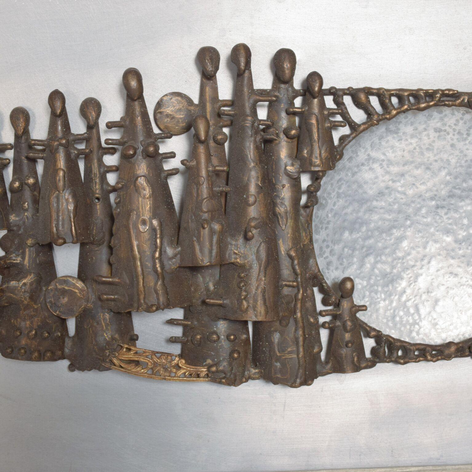 Wall Sculpture
1960s Mexican Modern Wall Art Abstract Sculpture with Figures crafted in Bronze and Glass.
13 3/4