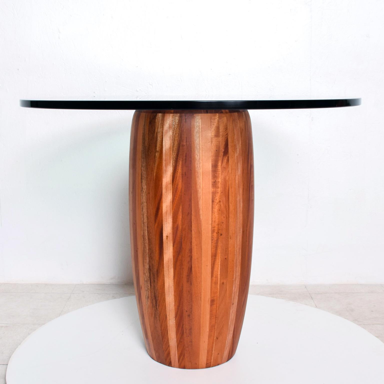 For your consideration, a center table. The pedestal base is constructed with solid cedar wood. The glass top is about 3/4
