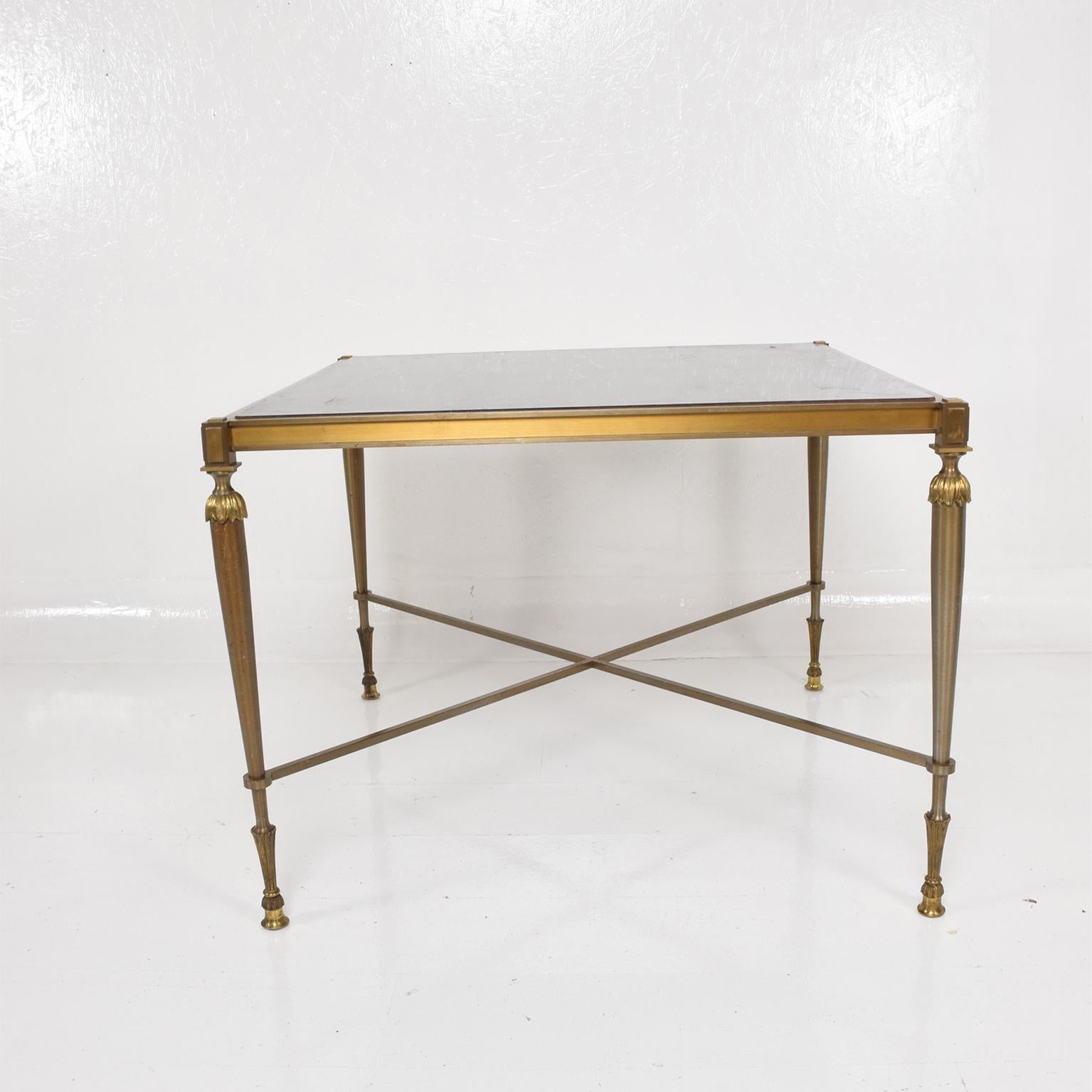 For your consideration, a Mexican Modernist Neoclassical Game Table Attr Arturo Pani.
Beautiful construction with brass and stainless steel.
The reversive top has a black Formica in one side and black leather on the opposite side. 
Dimensions:37