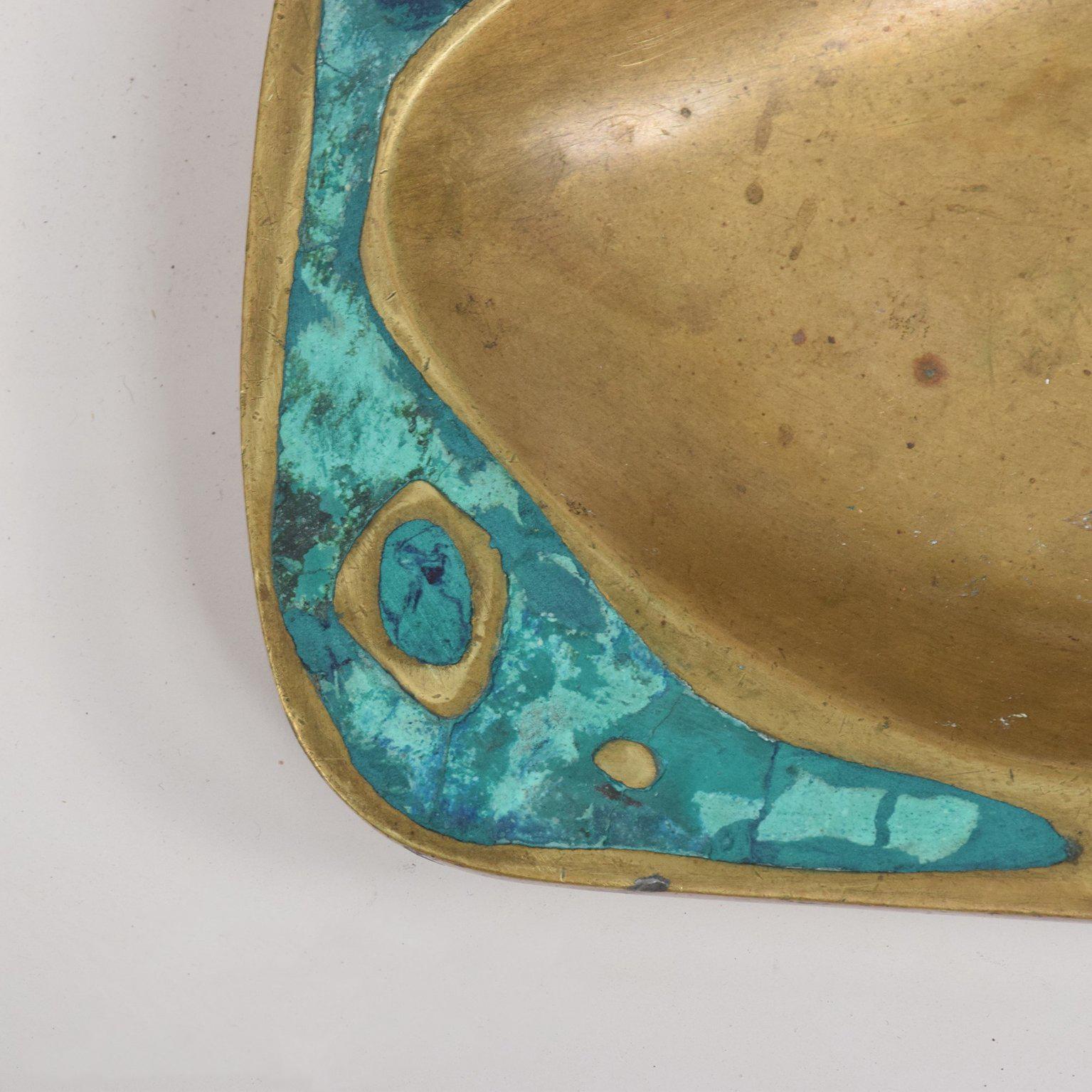 For your consideration a Mid-Century Modern dish made of brass with malachite.

Stamped 