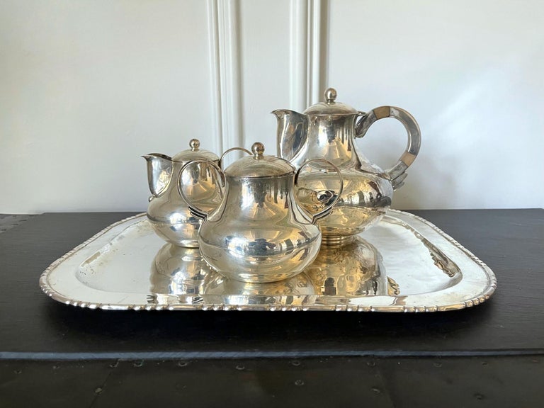 An early four-pieces sterling silver coffee or tea serve set by Hector Aguilar (1905-1986) circa 1940-1945 per mark 