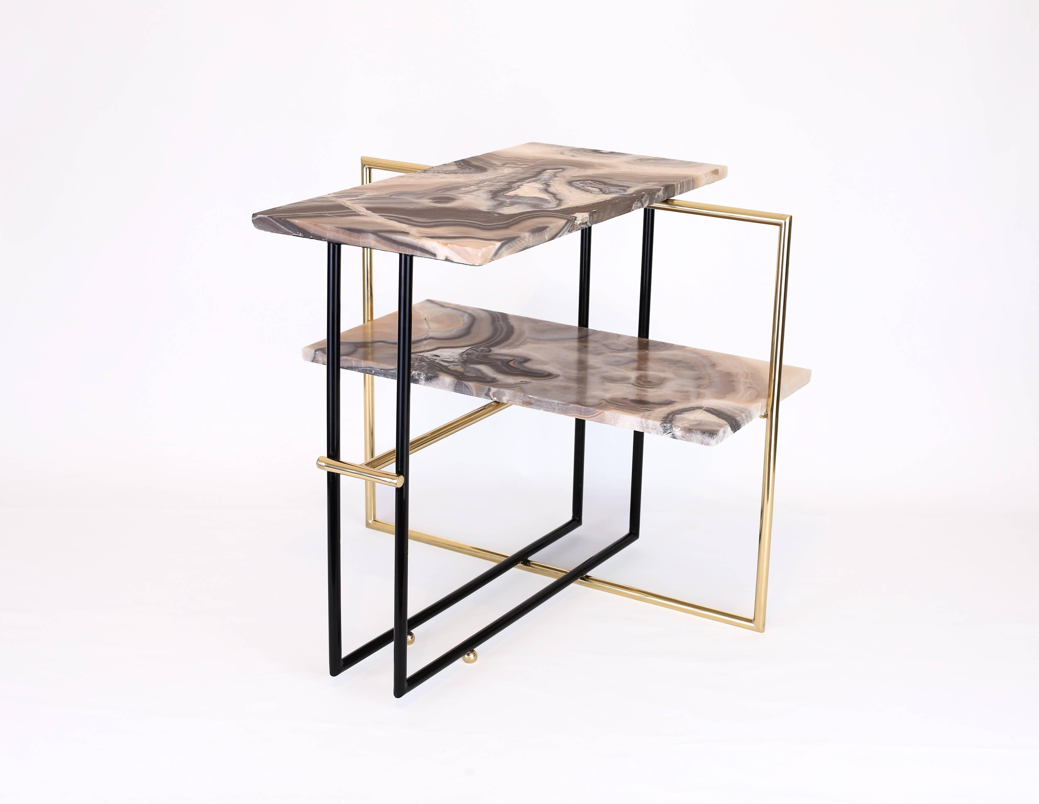 The UÑA table is fable, mythology and design blended together. The striking contrast between the stone’s solid weight and the apparent frailty of its legs make for a most intriguing game of tension and levity. The name derived from the Greek word
