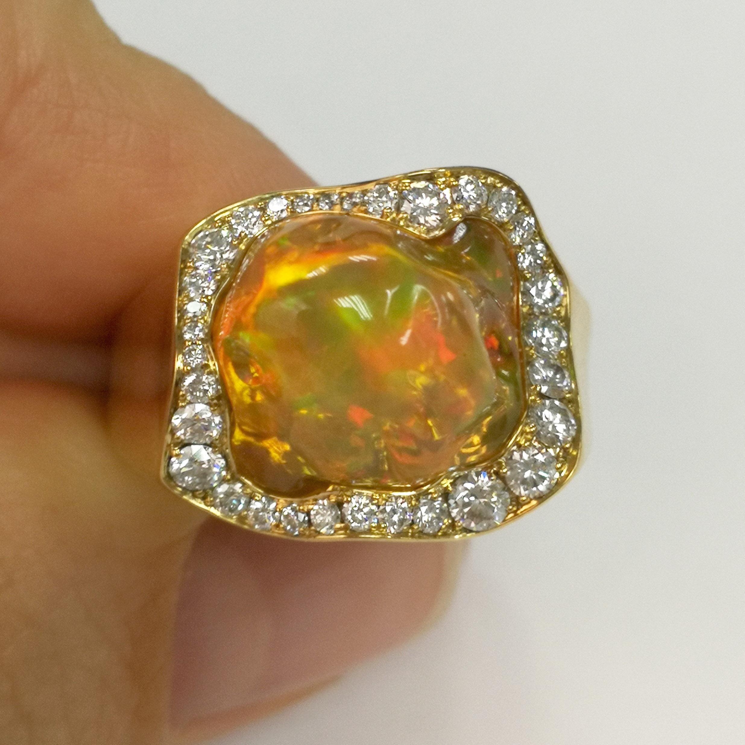 Mexican Opal 7.31 Carat Diamonds One of a Kind 18 Karat Yellow Gold Ring
Opals, unlike many other stones, are almost impossible to cut, they are always unique. Therefore, jewelry with Opals is always improvisation. It also happened with this Ring.