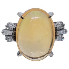 Mexican Opal Oval Cabochon and White Diamond Baguette Cocktail Ring in Platinum
