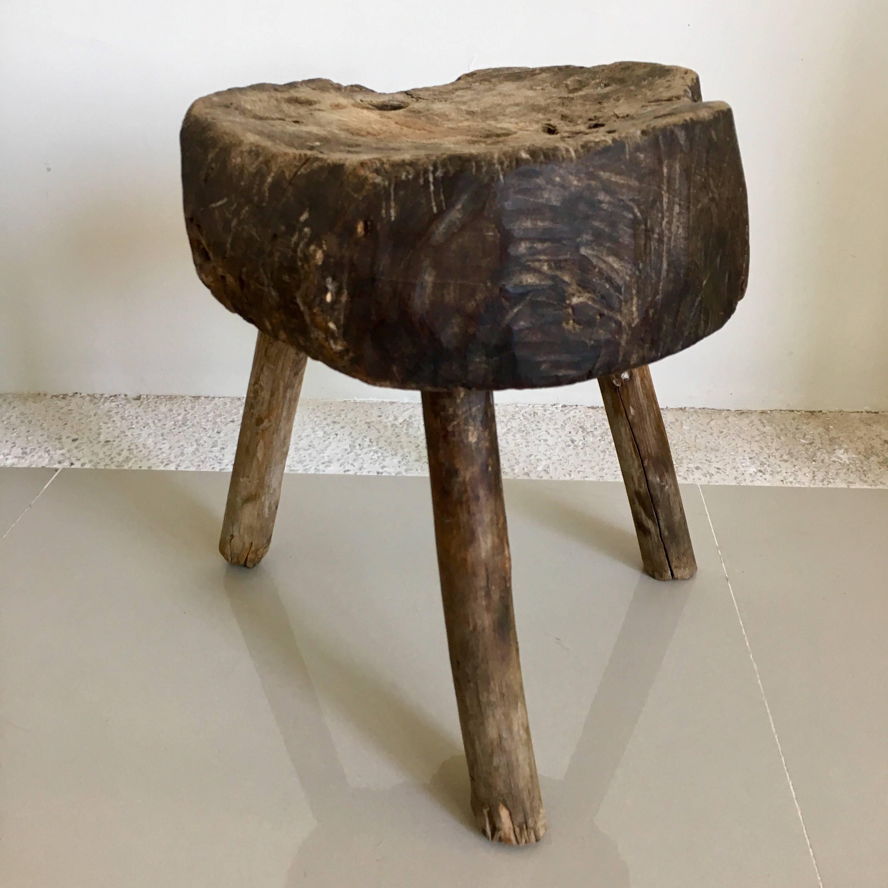 Primitive mesquite stool from the Guanajuato area of Mexico. Excellent patina and original legs. One of a kind object. Structure is sound and solid. Measure: Seat 4