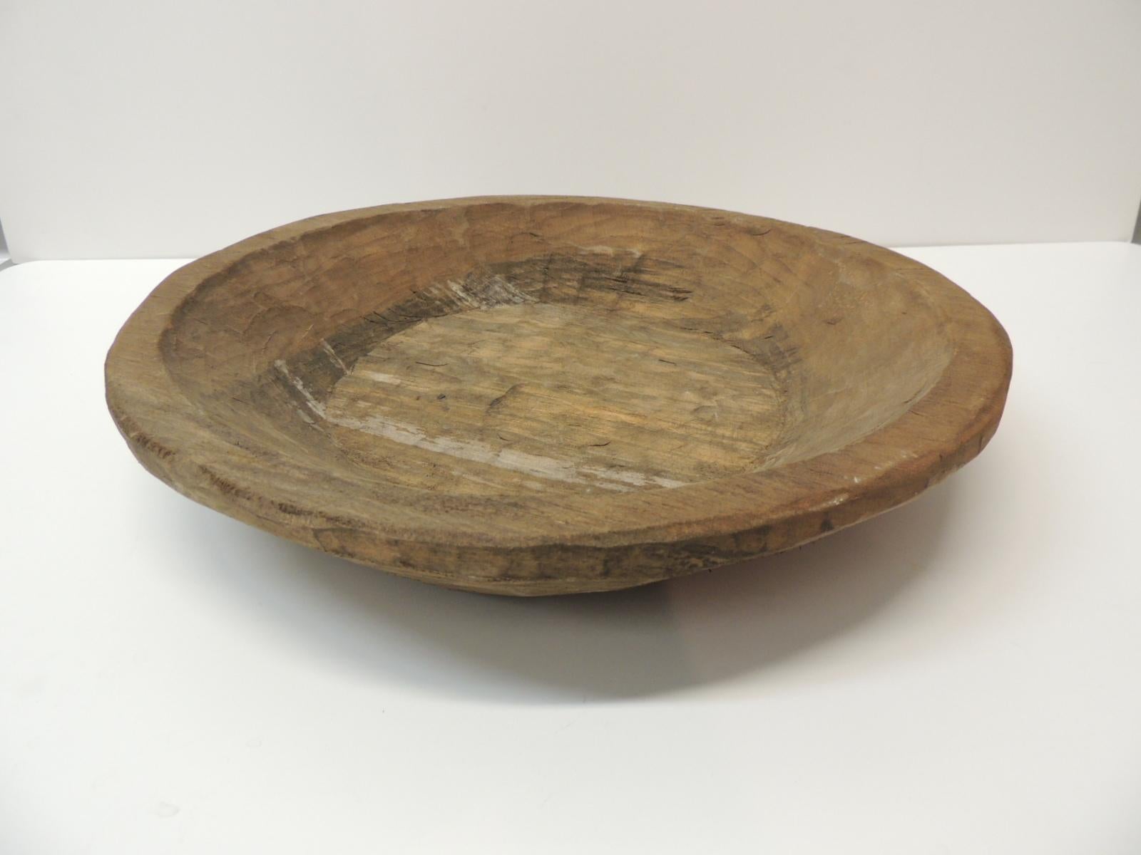 Mexican round hand carved rustic bowl
Size: 16” D x 3” H.
   