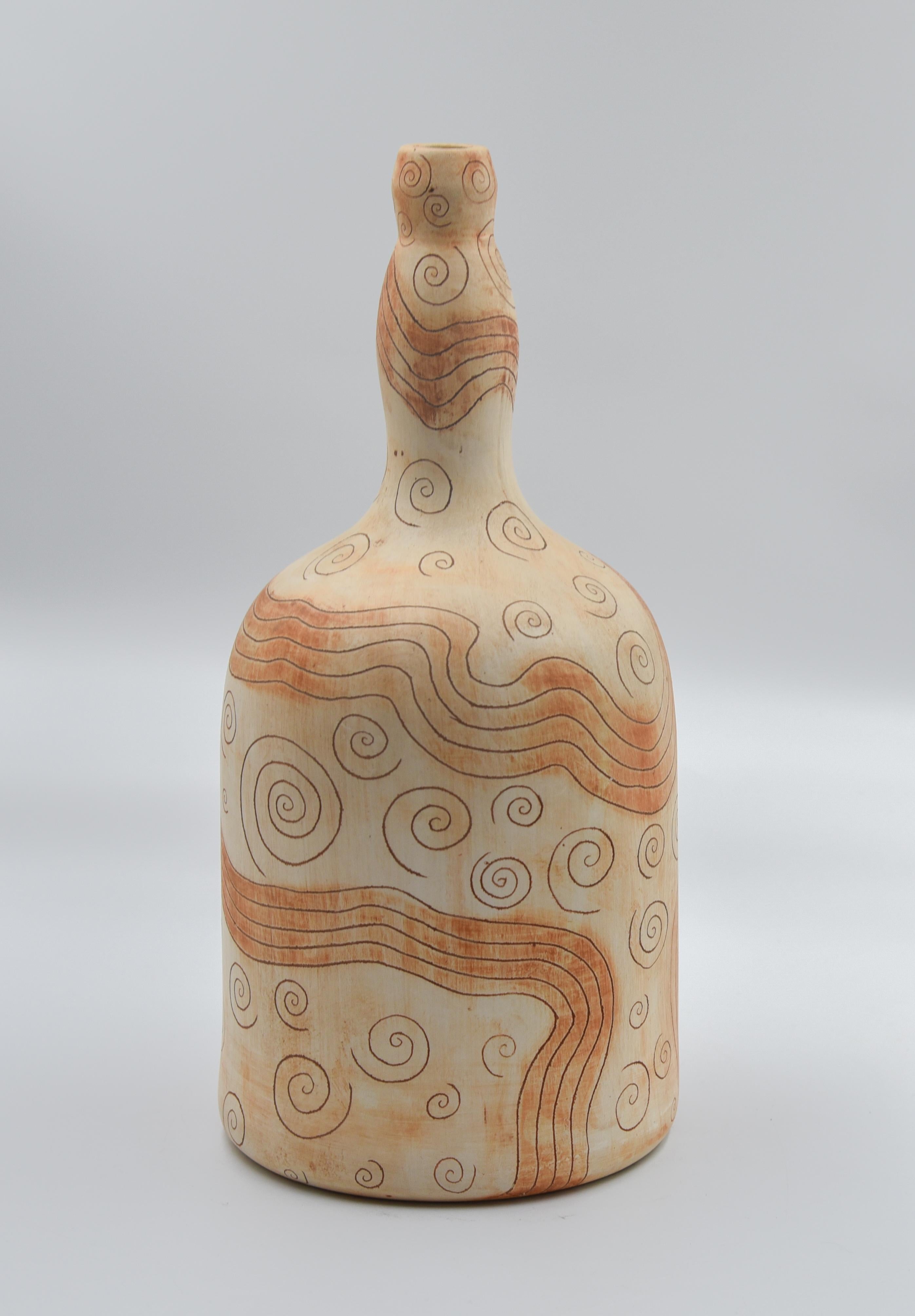 mezcal in ceramic bottle
