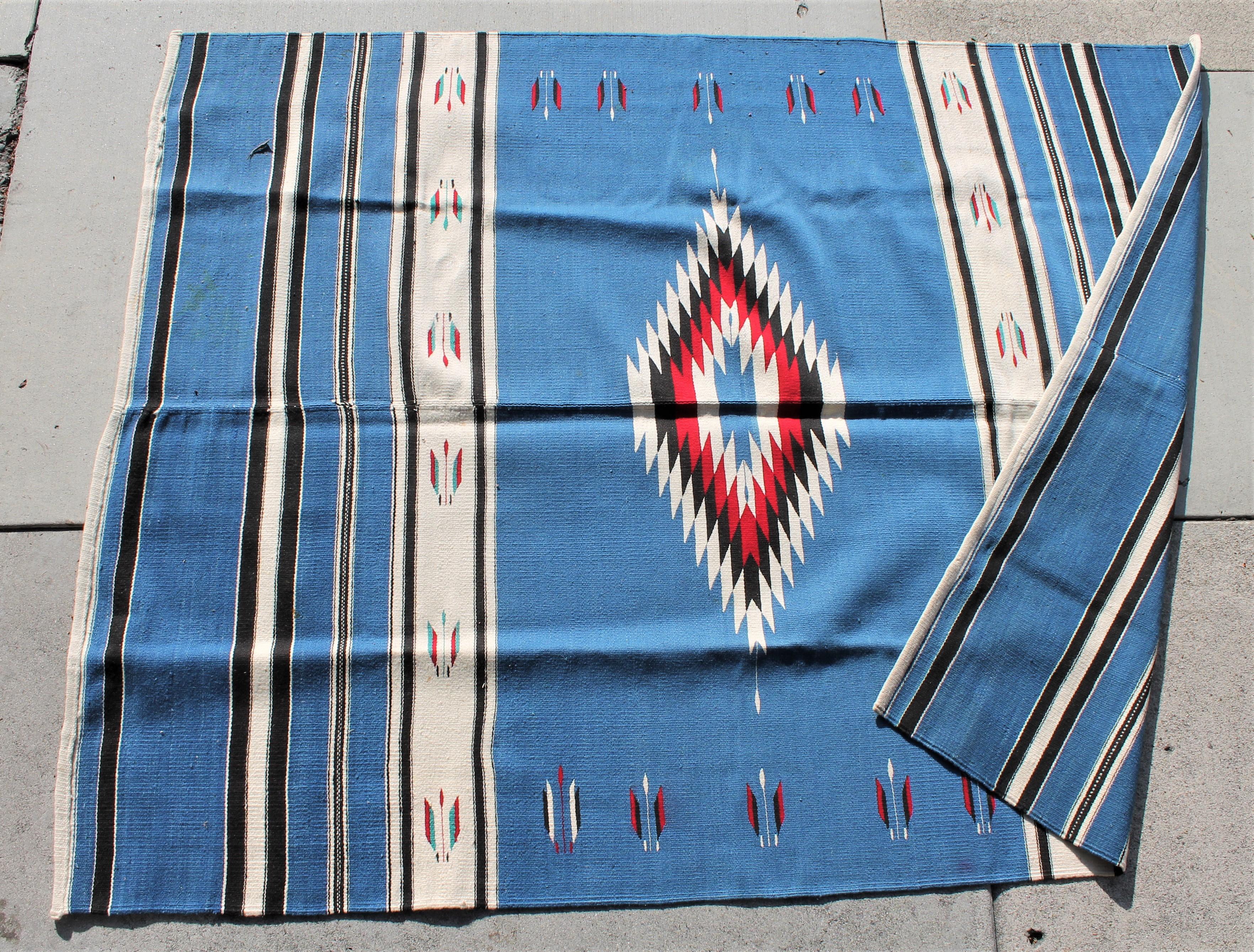 This fine Mexican Indian weaving is in pristine condition and has the original vibrant colors.