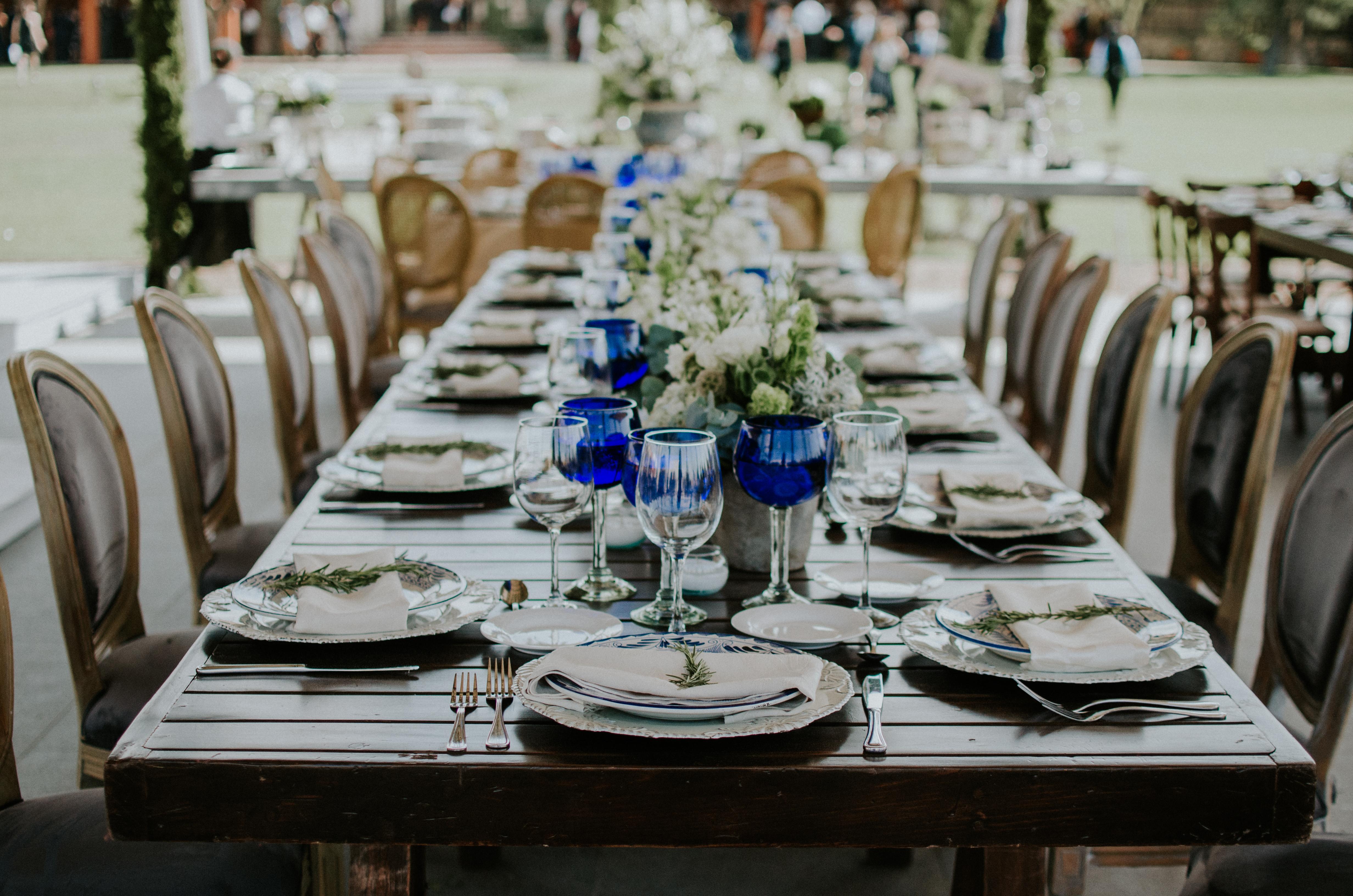 Enhance your table with these stunning handblown cobalt blue glass goblets, crafted by skilled artisans in Guadalajara, Mexico. Each piece showcases the beauty of traditional Mexican glassblowing, making them a perfect addition to wedding table
