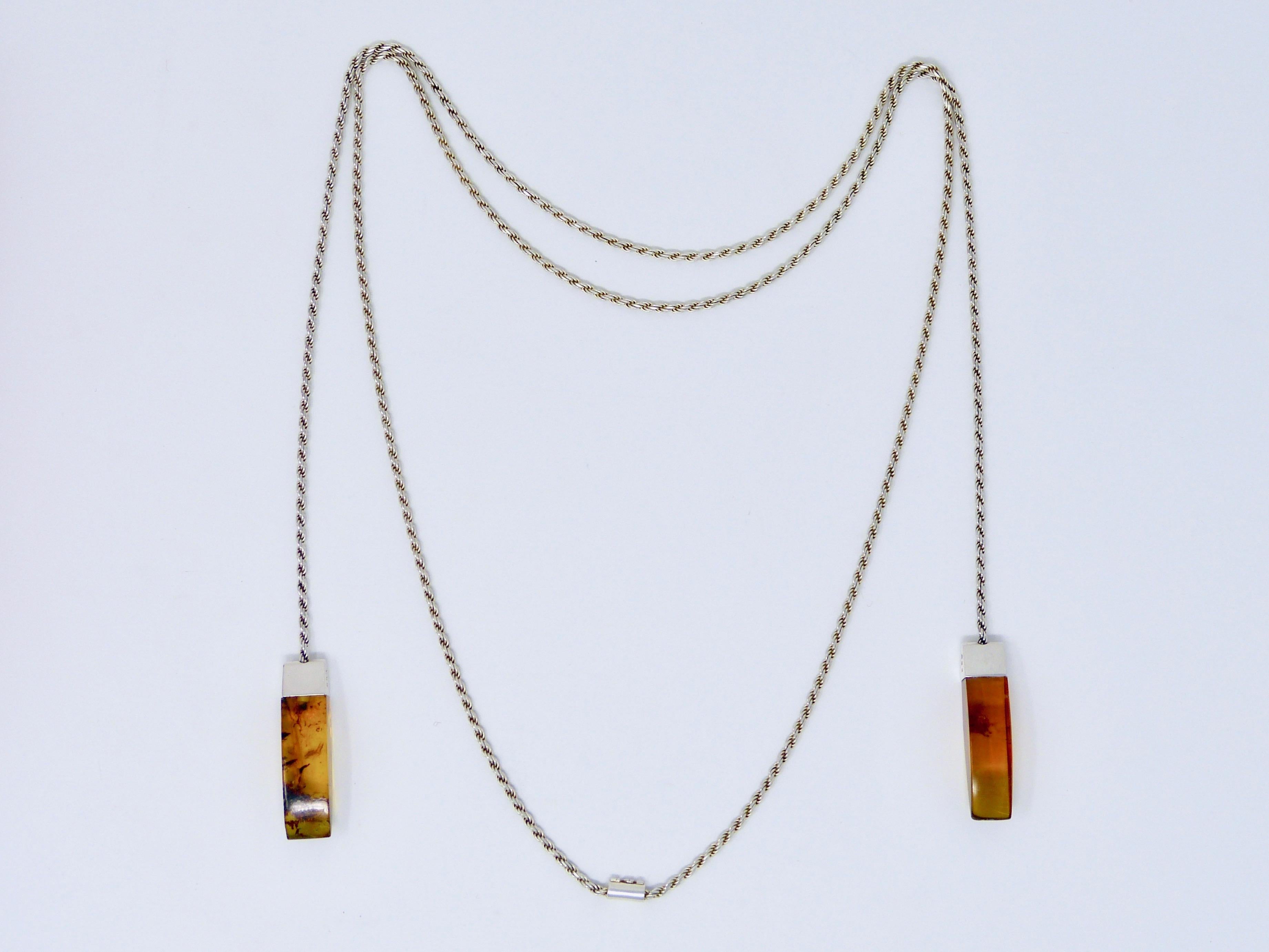 Sterling silver and amber necklace 
Made by Tane
The necklace measures 55