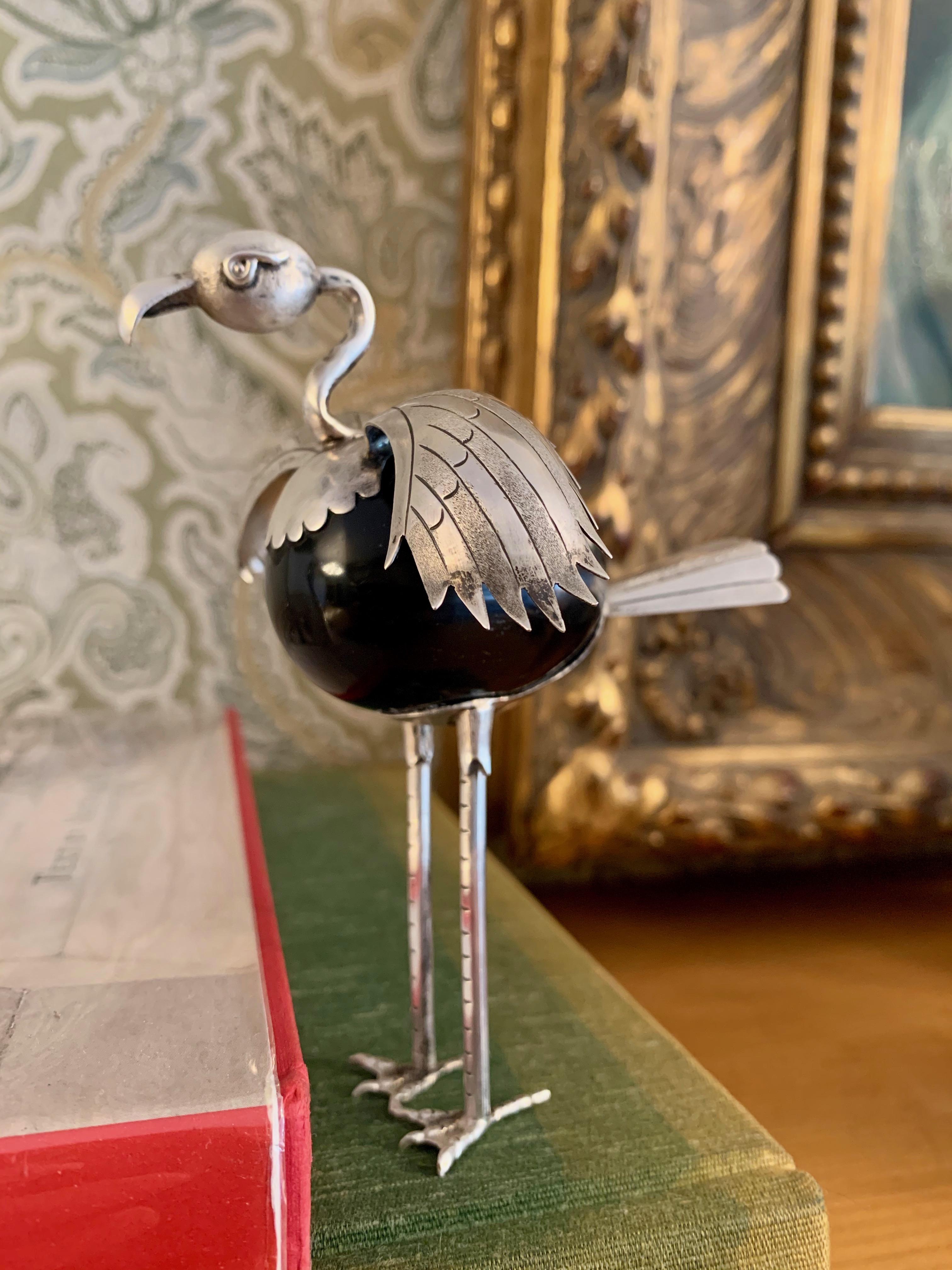 Mexican sterling silver and onyx bird sculpture, an onyx egg shaped body, with sterling 925 legs, wings, and head. A wonderful decorative piece with nice detailing to the wings, head and legs.