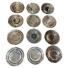 Ensemble de douze petites assiettes à dessert mexicaines en argent sterling