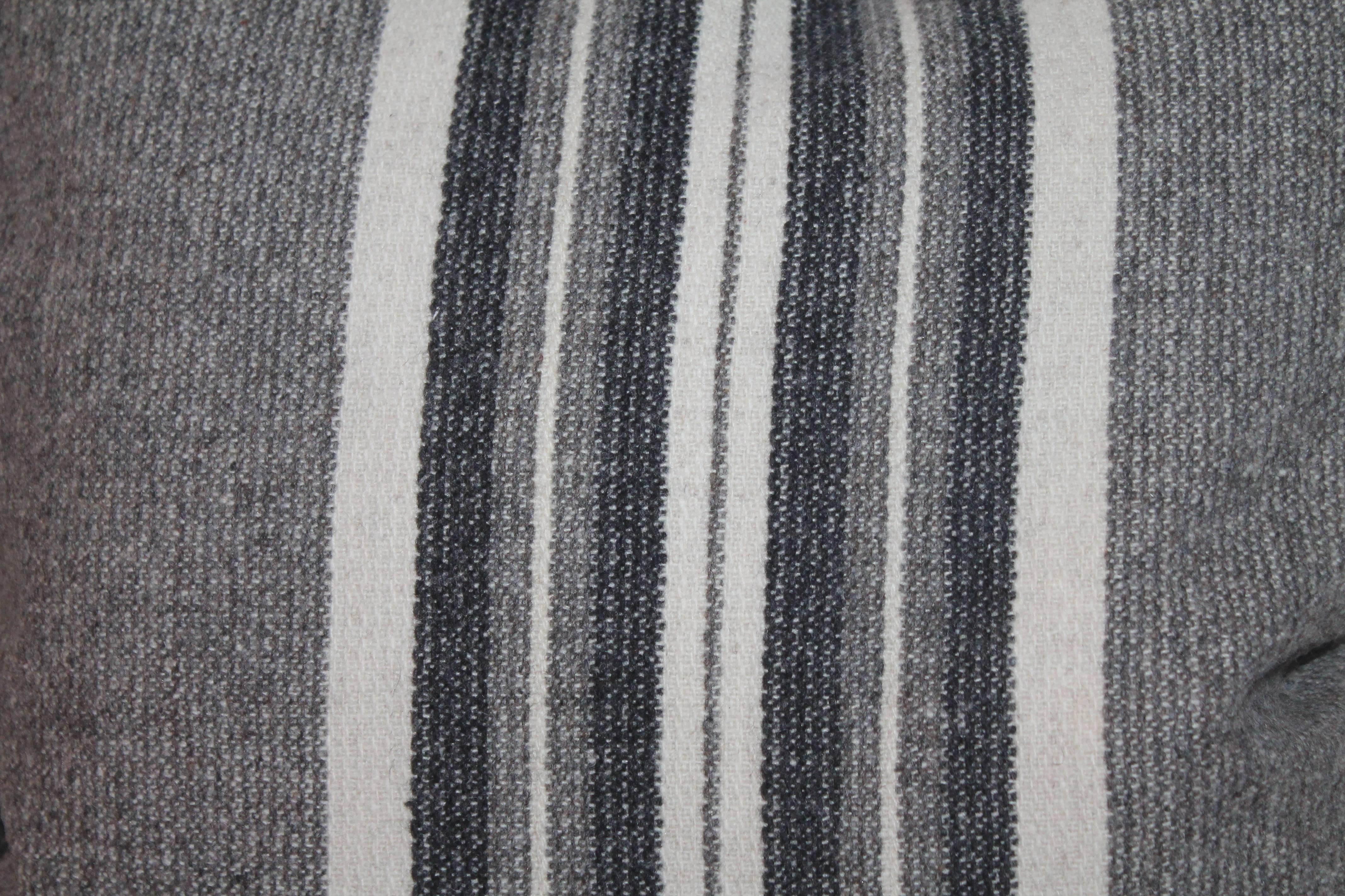 Fine Mexican /American wool striped Indian weaving pillows with soft grey leather backing. Sold in pairs.