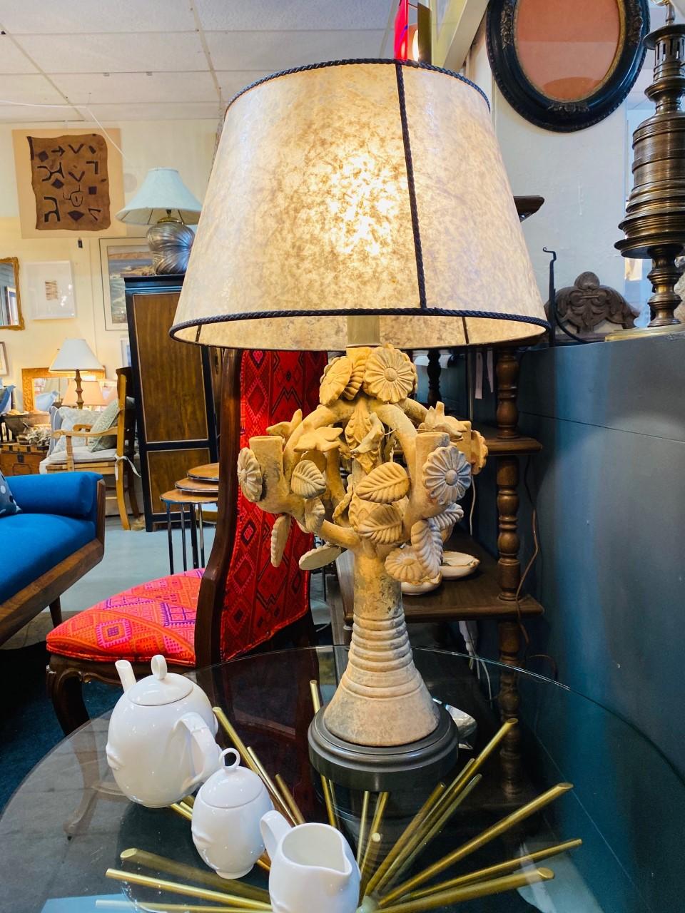Beautiful and rare Mexican tree of life candelabra lamp in the style of Aurelio Flores. This lamp is constructed over the sculptural rendition of a Tree of Life Candelabra piece. This creation constructed out of clay, presents the allegorical tree