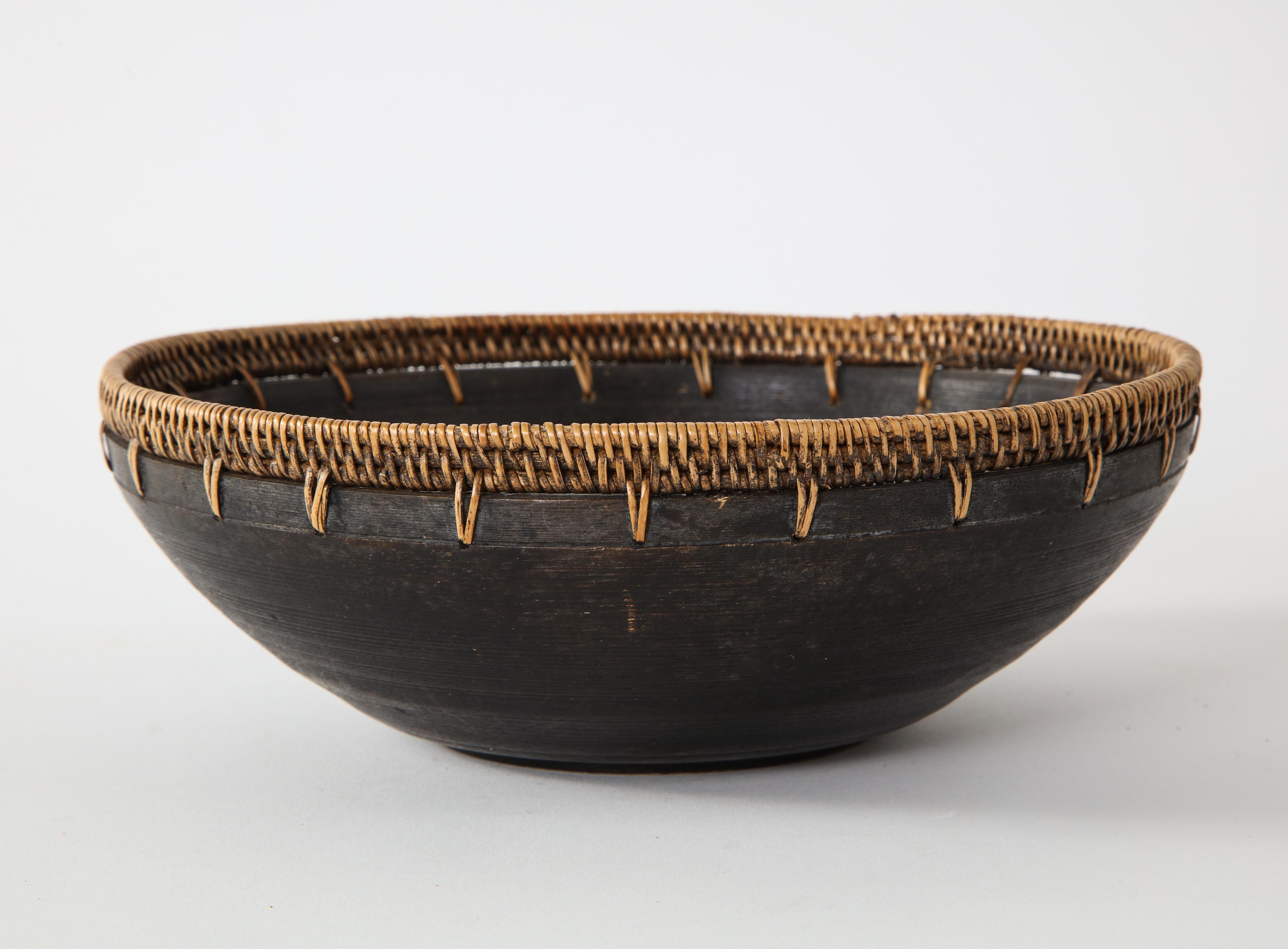 Mexican wood and raffia bowl.