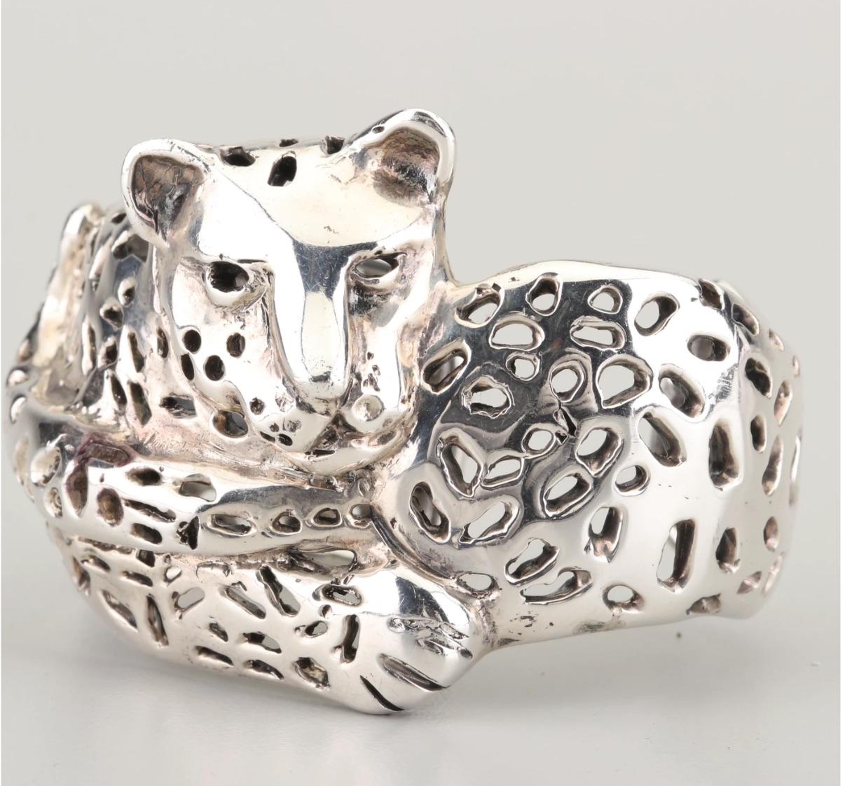 A Rare Superb wild Modernist Brutalist Exotic Mexico Sterling Silver Jaguar Cuff Bracelet by noted silver artisan Emilia Castillo of Taxco Mexico, fully Hallmarked,  from the family of the most elevated artisans of Mexico jewelry-Los Castillos. 
The